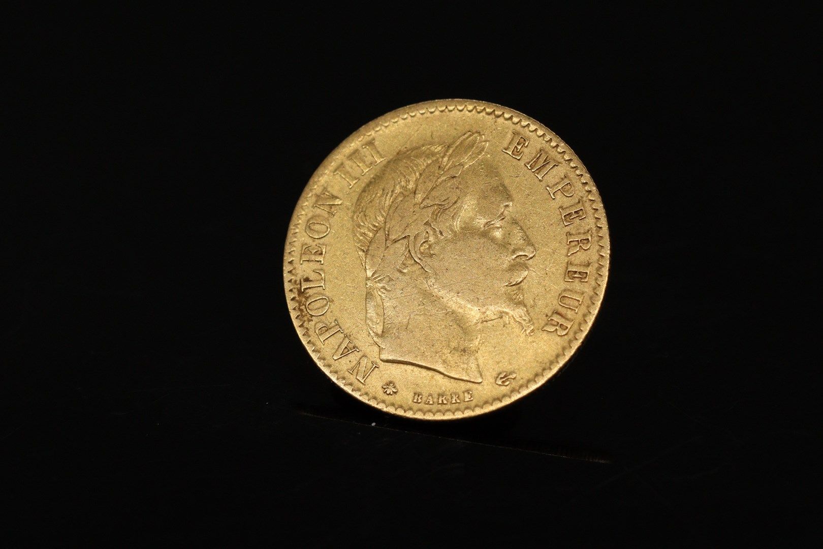 Null 10法郎拿破仑三世头顶桂冠金币 1862年，A.

重量：6.45克。