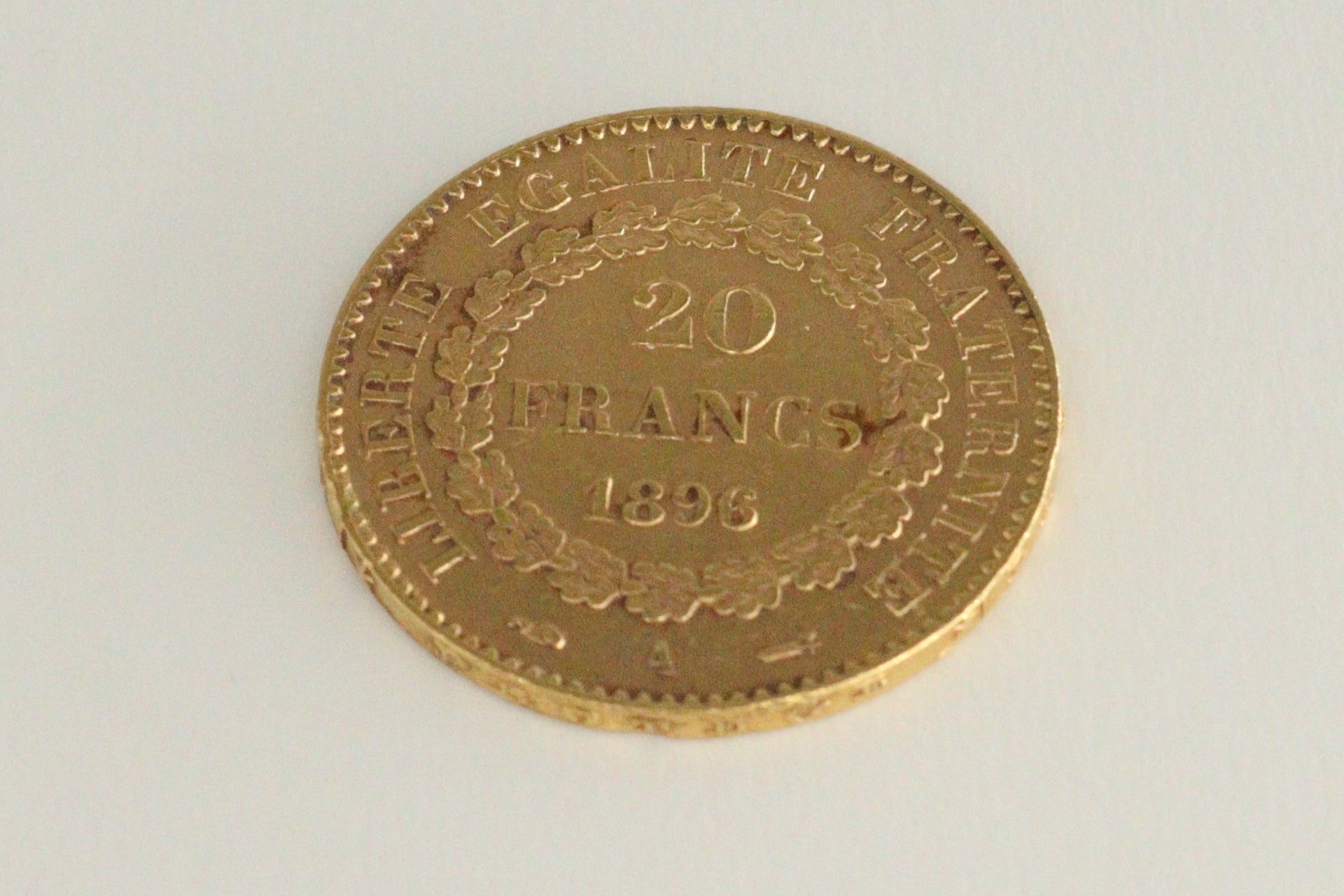 Null Gold coin of 20 Francs génie (1896) 

Weight : 6.45 g.