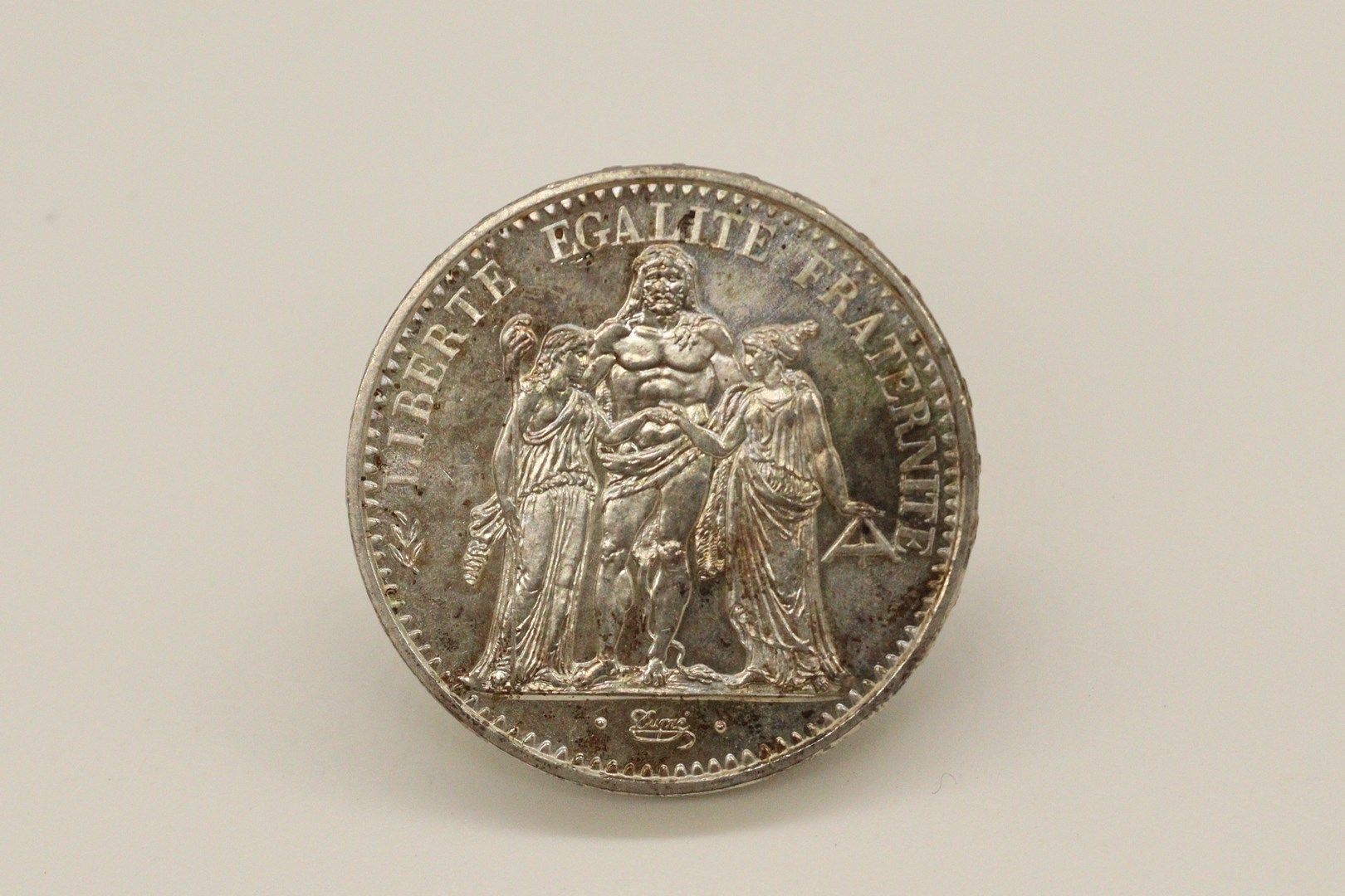 Null Silver coin of 10 francs Hercules 1965.



Weight : 25 g.