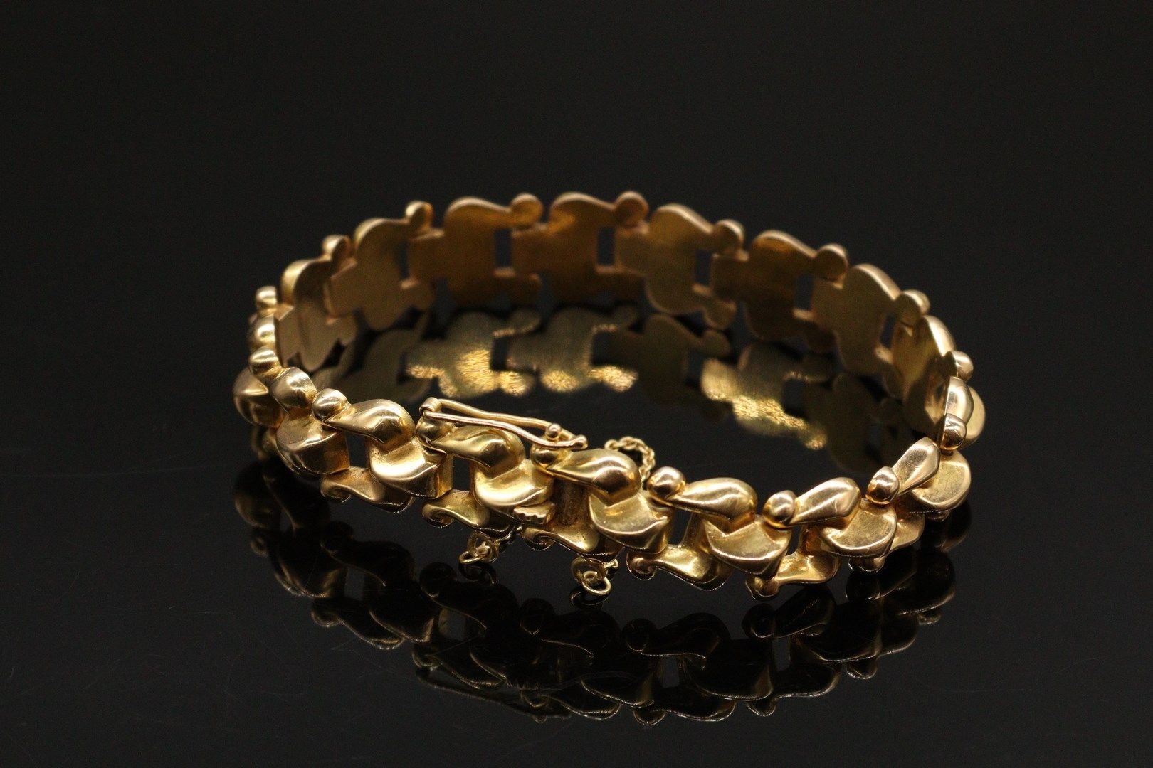 Null Bracelet articulé en or jaune 18k (750).

Tour de poignet : env. 16 cm - Po&hellip;