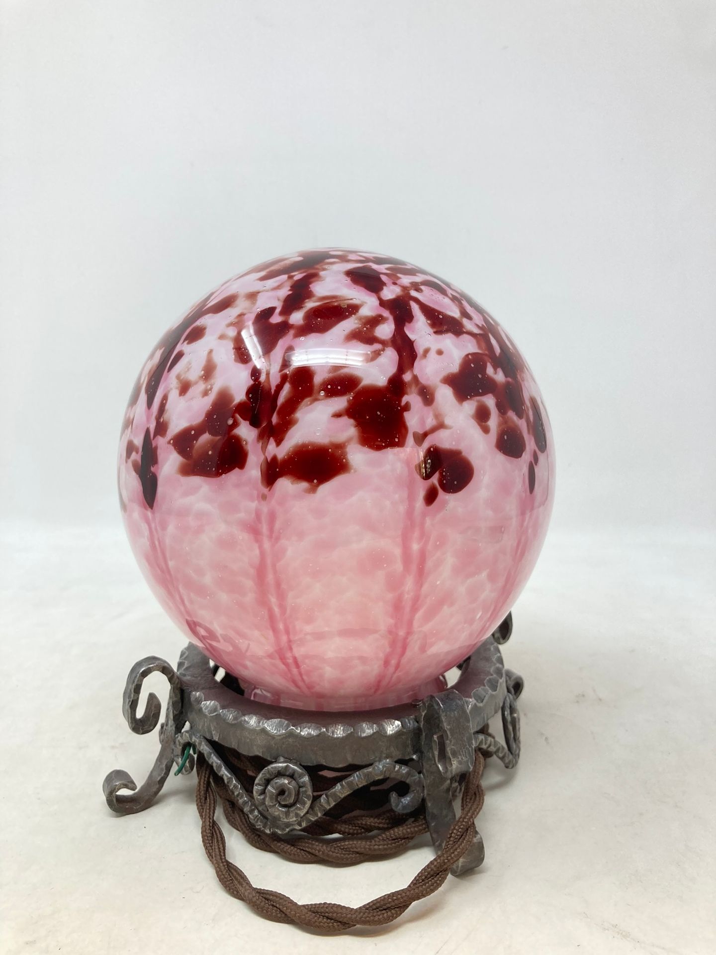 Null Small pink glass ball night light on a wrought iron base decorated with int&hellip;