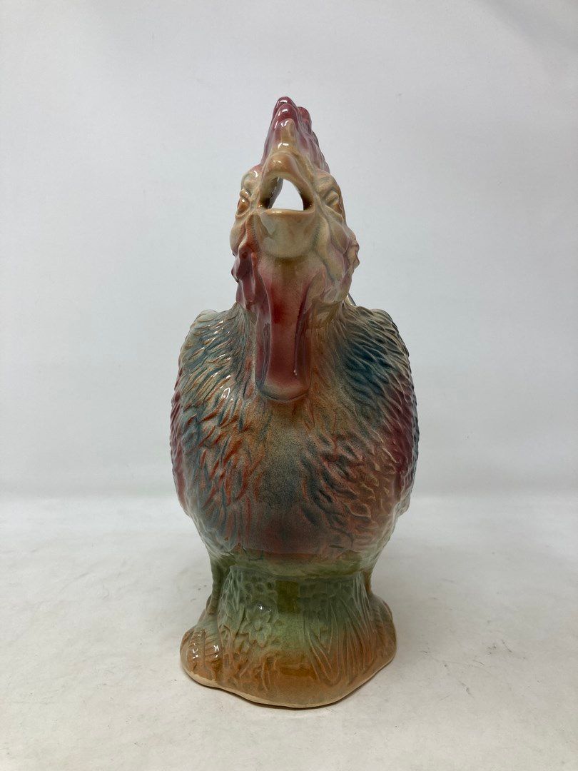 Null Brocca di Barbotine raffigurante un gallo. 

H. 26 cm
