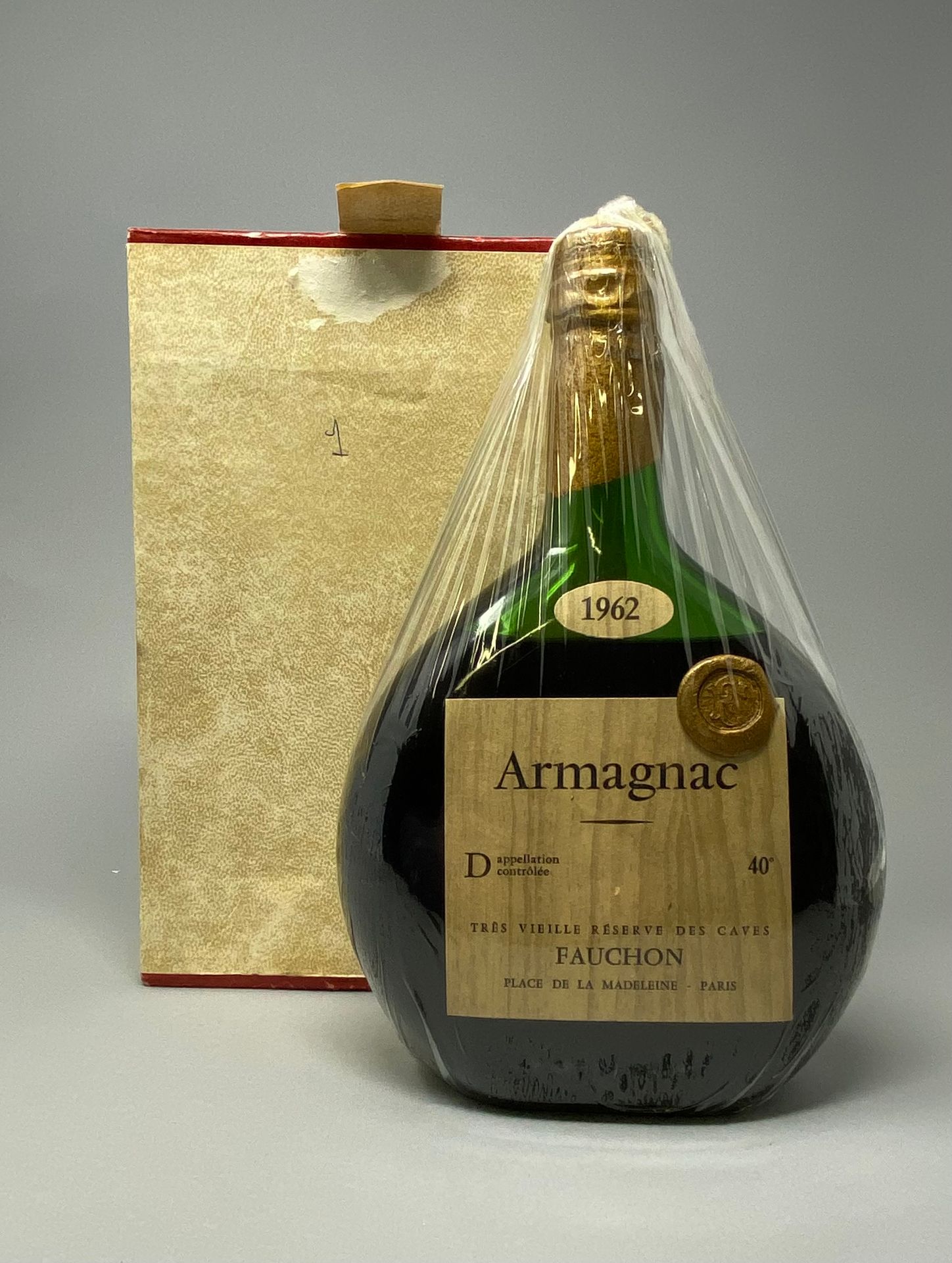 Null 1	 bouteille 	ARMAGNAC 		Fauchon 	1962	 (MB)