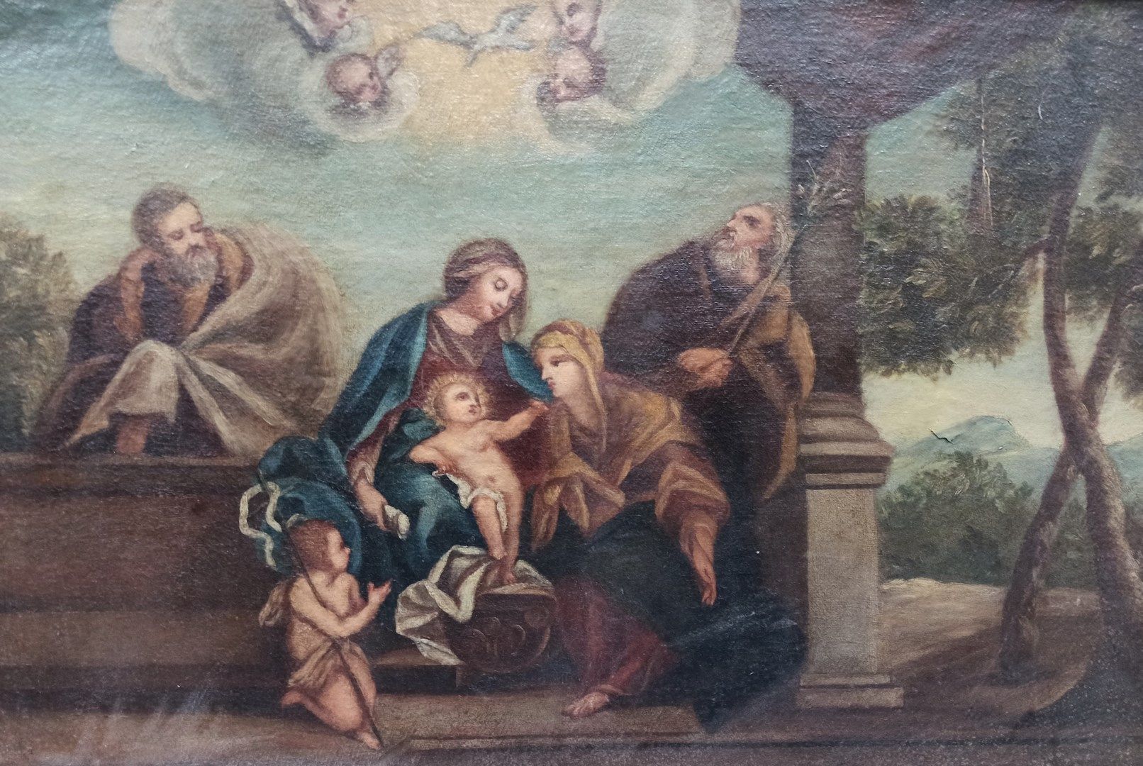 Null 意大利学校 
在17世纪中叶的品味中

圣家族与圣安妮、圣约阿希姆和小圣约翰。

布面油画（事故和右侧向中间的提升；修复）。
在反面的元素是一个红色的&hellip;