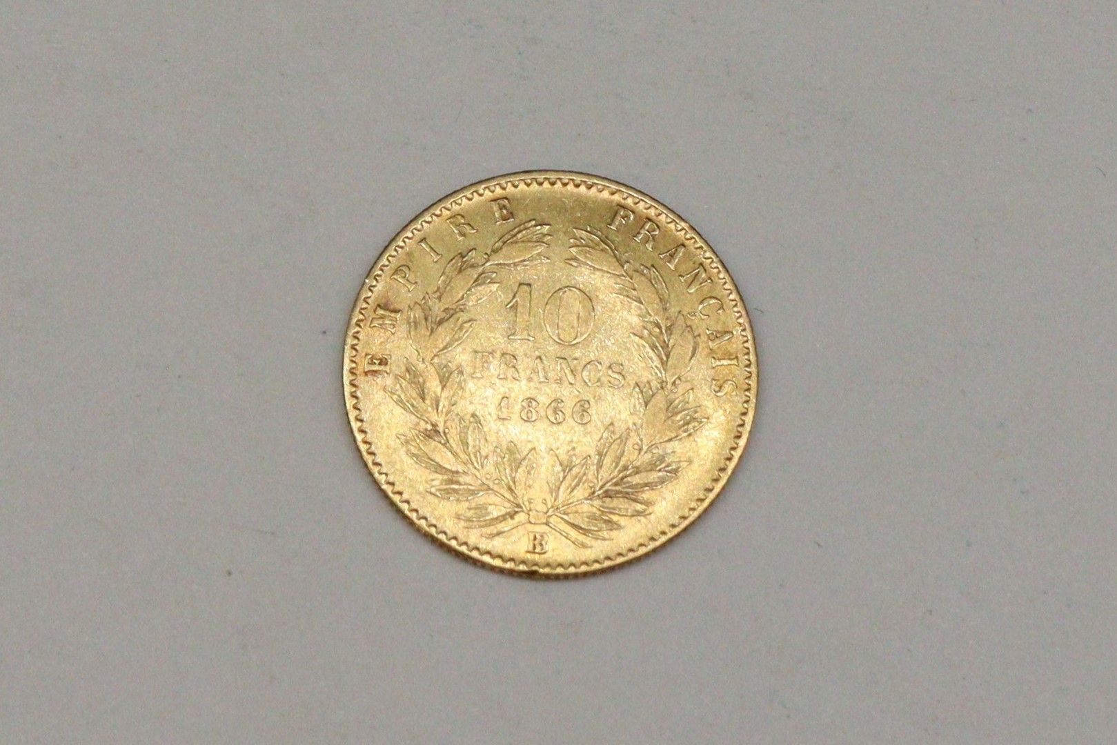 Null Gold coin of 10 Francs Napoleon III head laurel (1866)