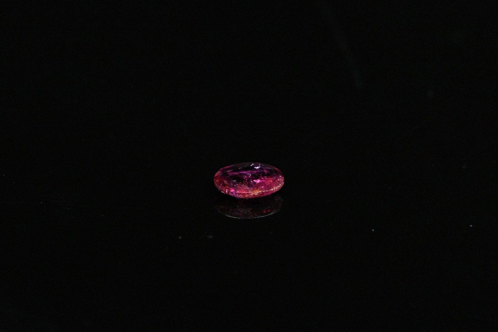 Null Oval tourmaline on paper. 

Weight : 0.98 ct.