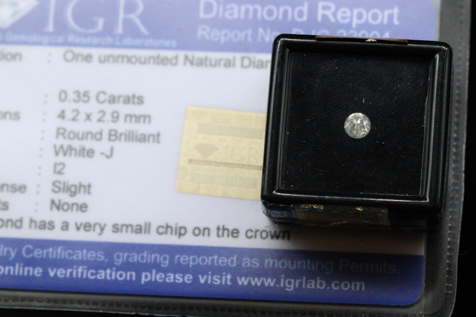Null Diamant "White J" rond sous scellée.

Accompagné d'un rapport de l'IGR atte&hellip;
