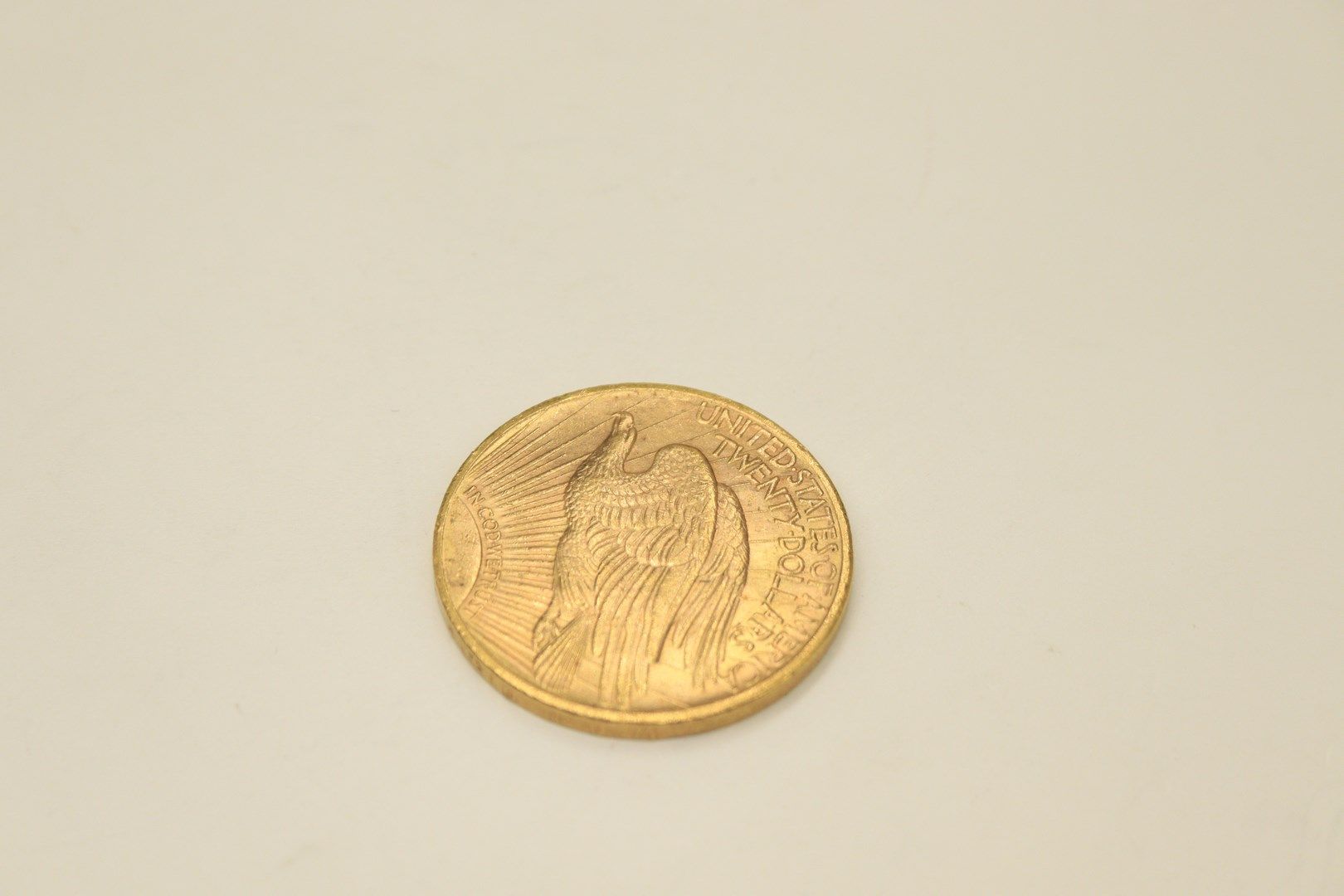 Null Gold coin of 20 dollars "Double Eagle" (1923).
Weight : 33.30g.