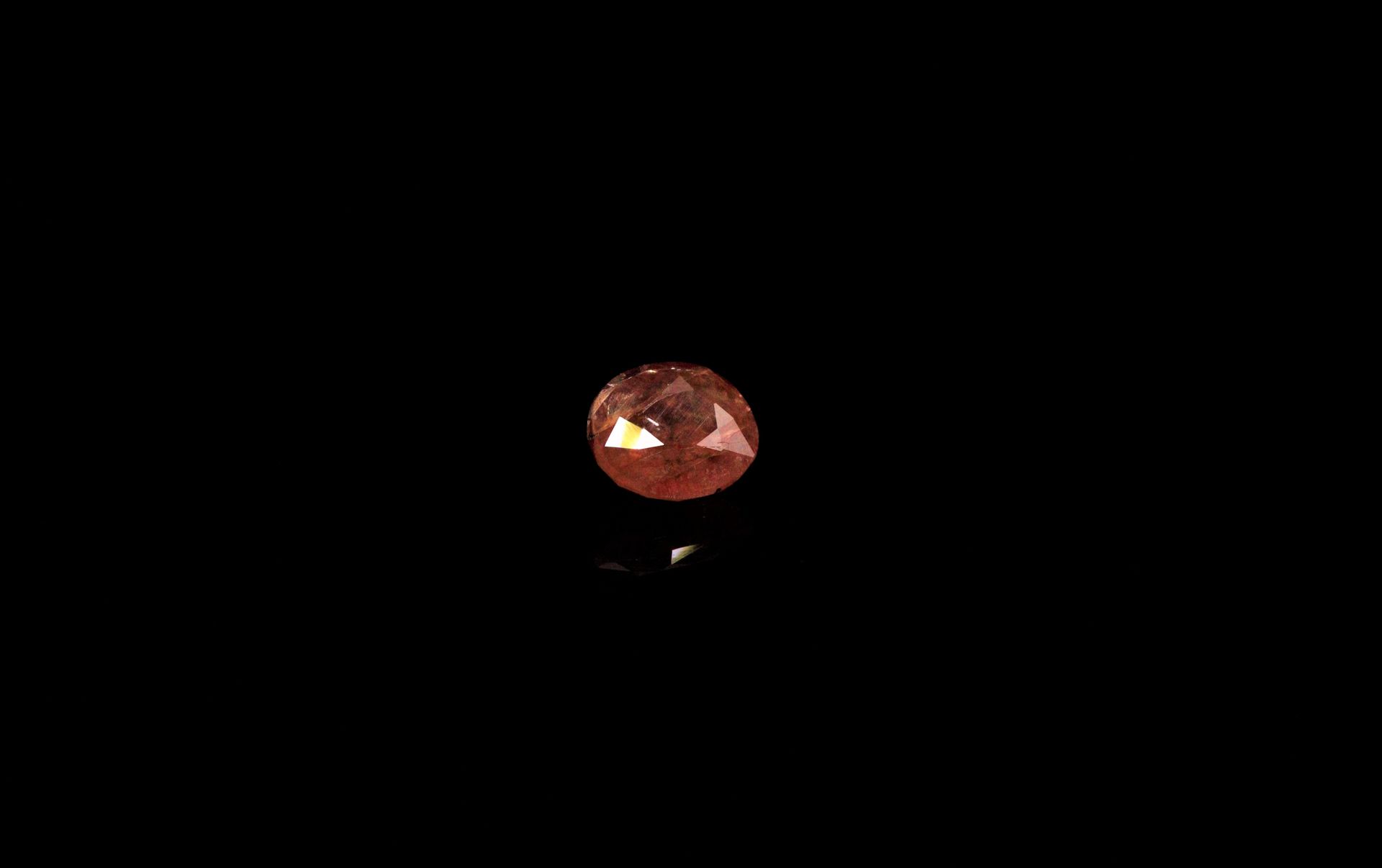 Null Oval orange sapphire on paper. 
Probably Mozambique, probably unheated. 
We&hellip;