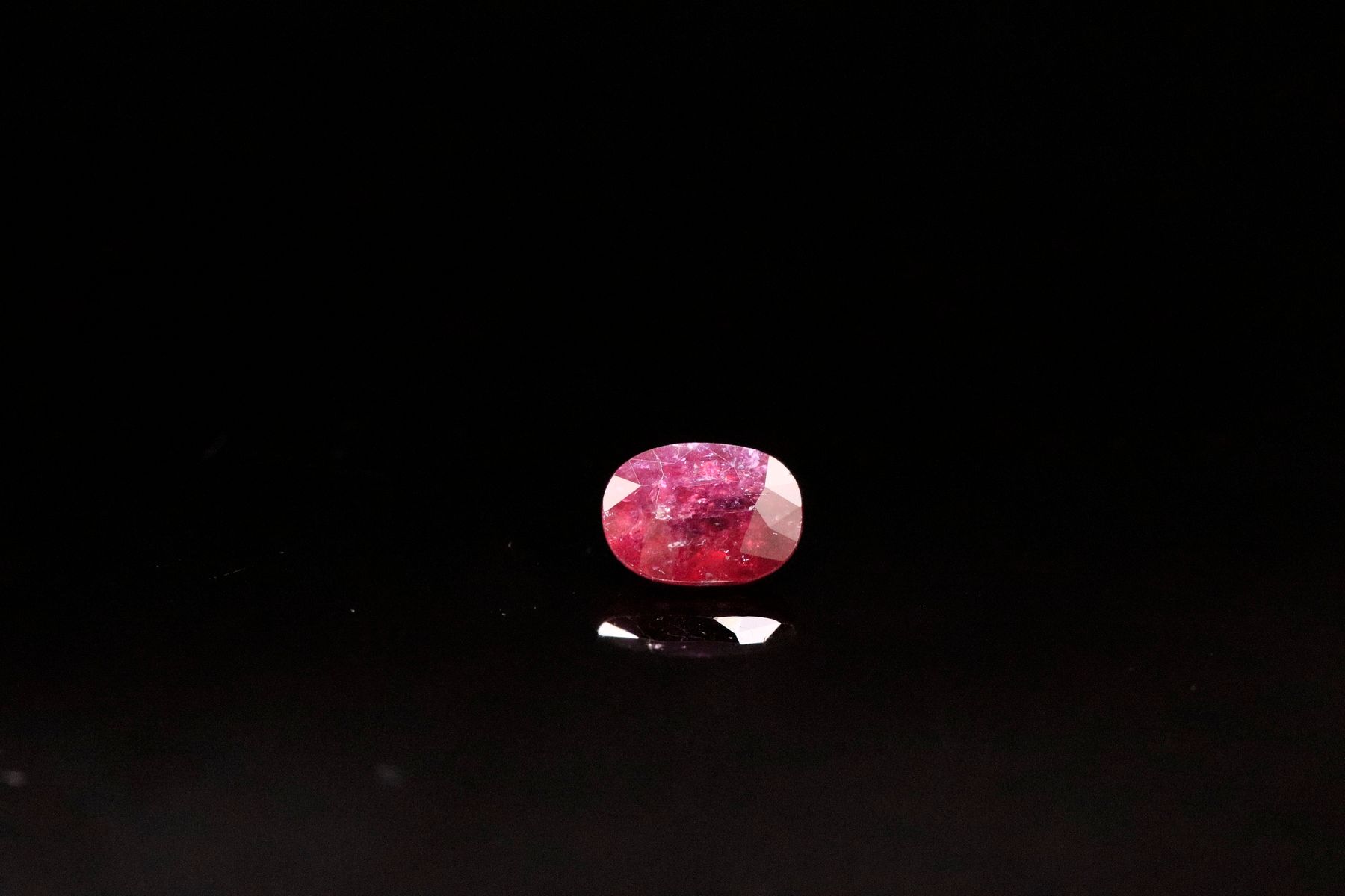 Null Oval ruby on paper.
Weight : 1.04 ct

Dimensions: 7mm x 5mm
