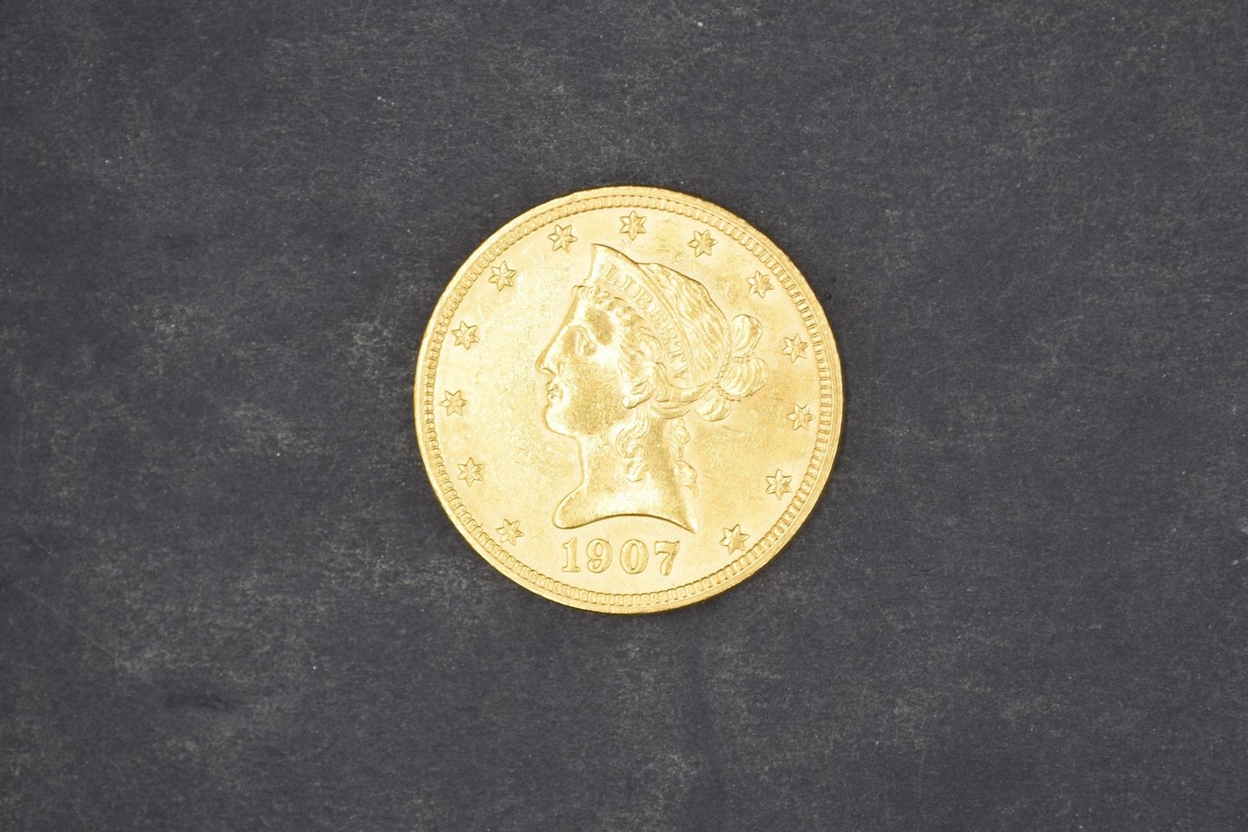 Null Pièce en or de 10 dollars Liberty avec devise (1907)
Poids Théorique : 16.7&hellip;