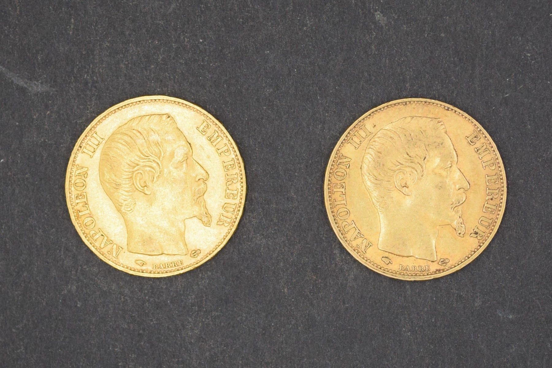 Null Deux pièces en or de 20 francs Napoléon III tête nue - 1856 A - 1857 A 

Po&hellip;
