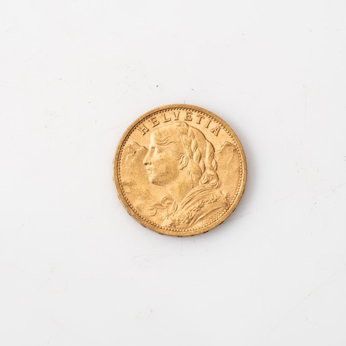 Null Une pièce en or de 20 Francs Helvetia (1899, B).

Poids : 6,45 g.