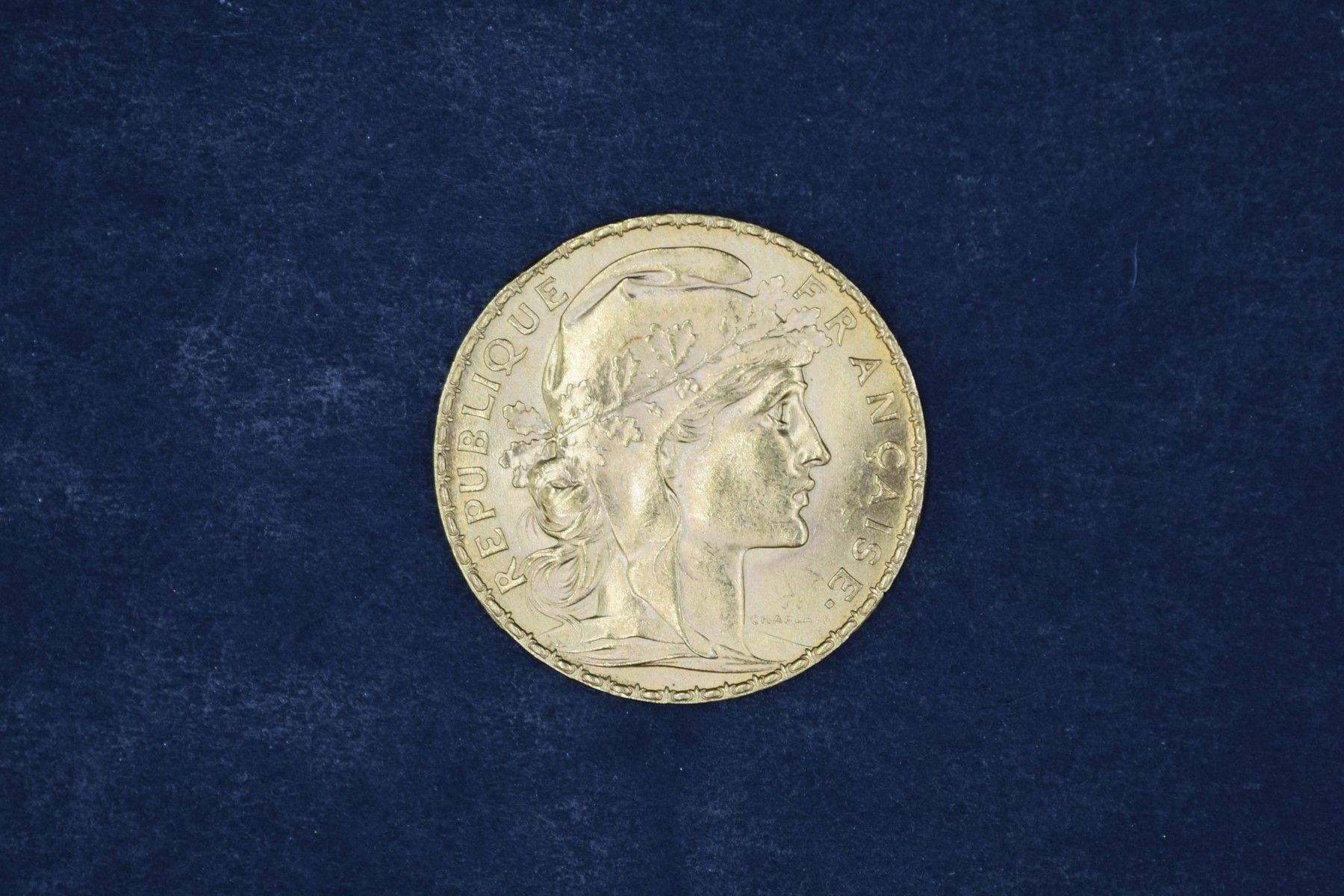 Null Pièce en or 20 Francs au Coq (1910)
Poids. : 6.44 g.