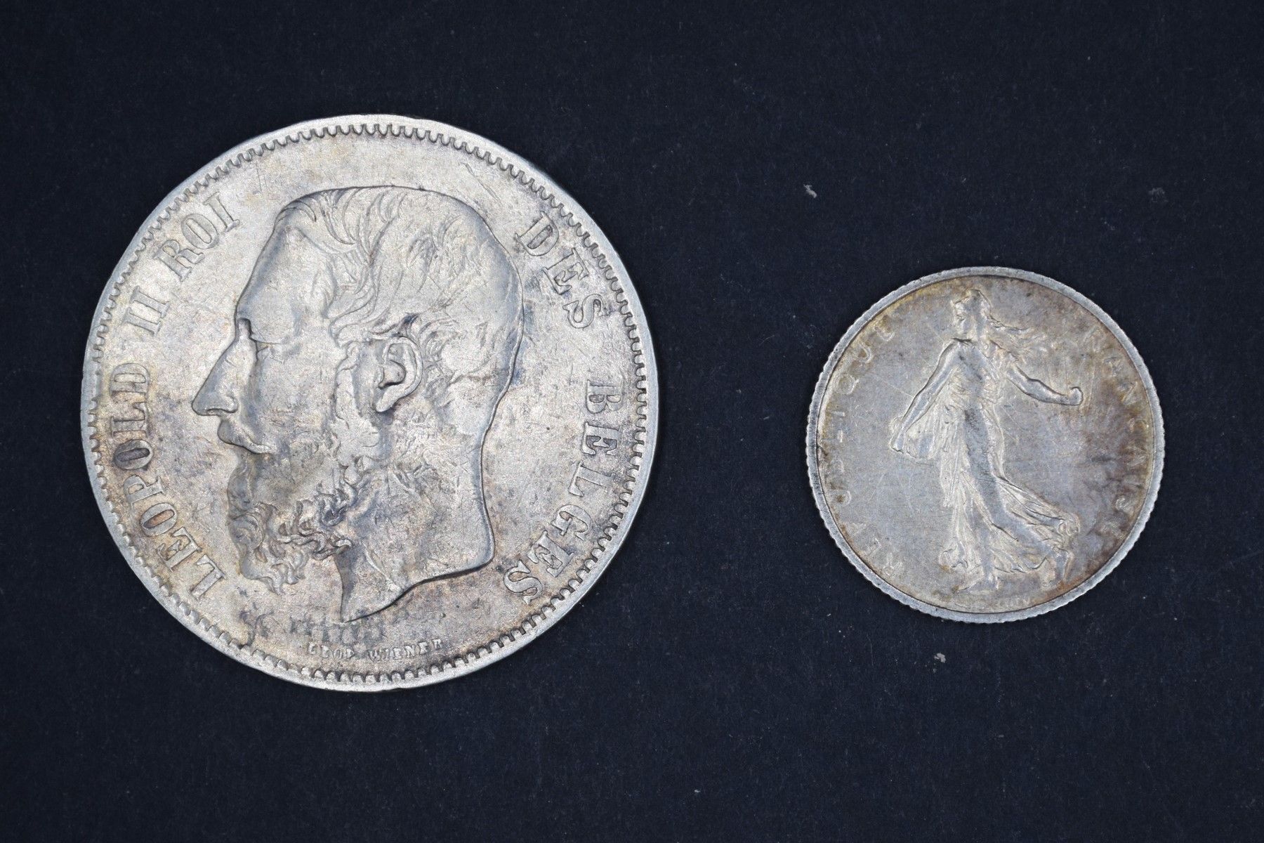 Null Deux pièces en argent :
- 5 francs belges Leopold II 1868
- 1 franc Semeuse&hellip;