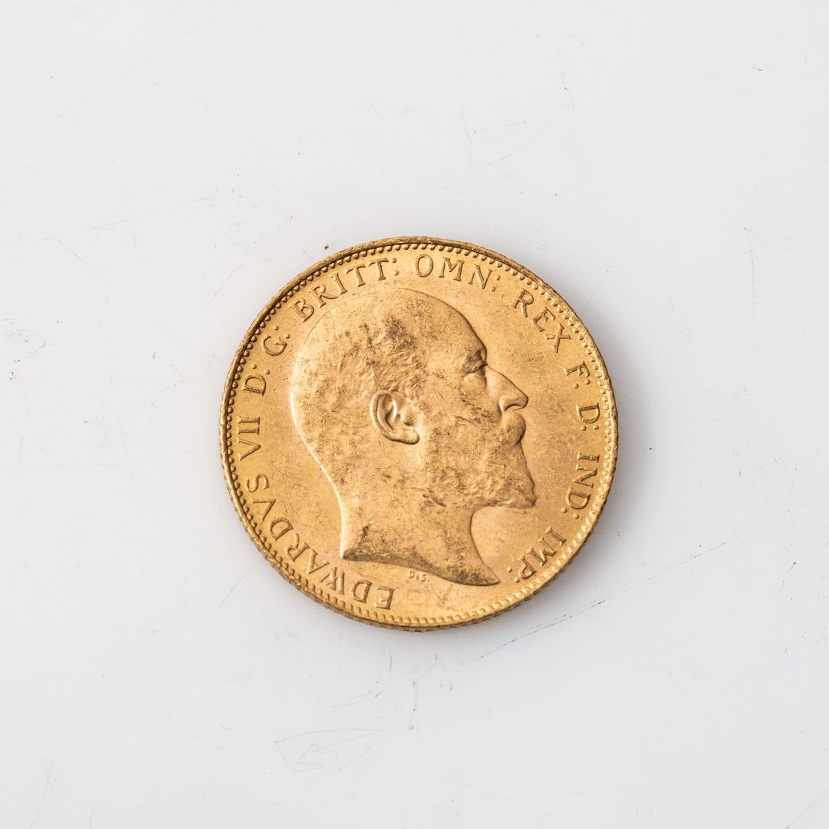 Null Une pièce en or d'1 Souverain Edouard VII (1907).

Poids : 7,98 g.