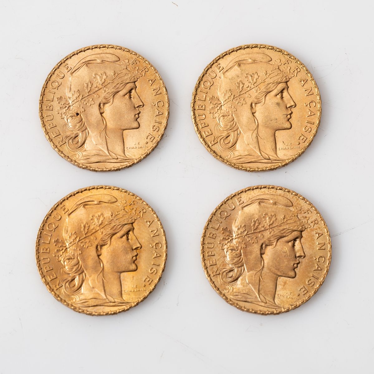 Null Quatre pièces en or de 20 Francs Coq (4 x 1913). 

Poids : 25,8 g.