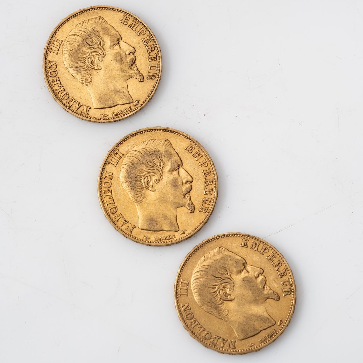 Null Trois pièces en or de 20 Francs Napoléon III tête nue (1855, A x 3).

Poids&hellip;