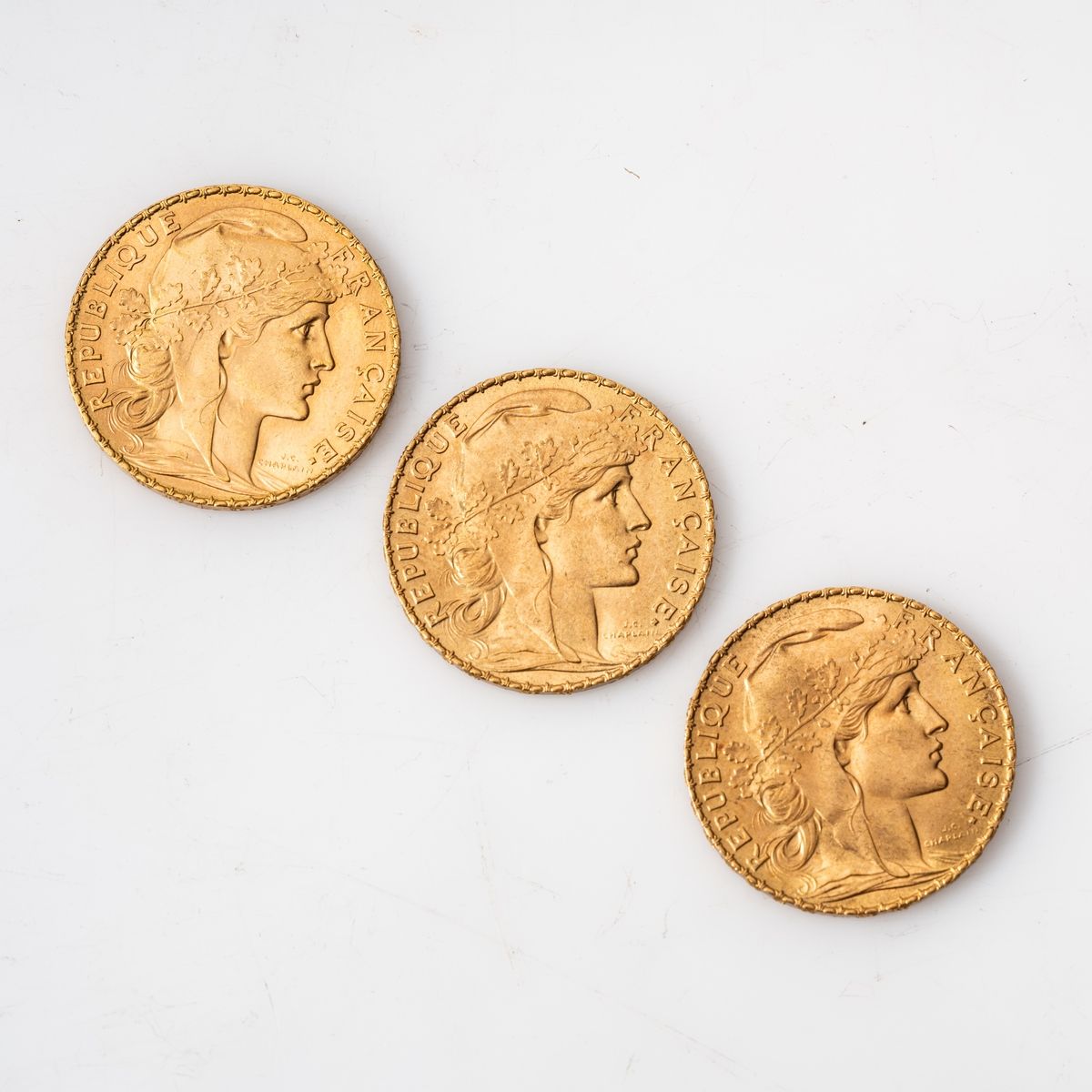 Null Trois pièces en or de 20 Francs Coq (3 x 1914).

Poids : 19,35 g.