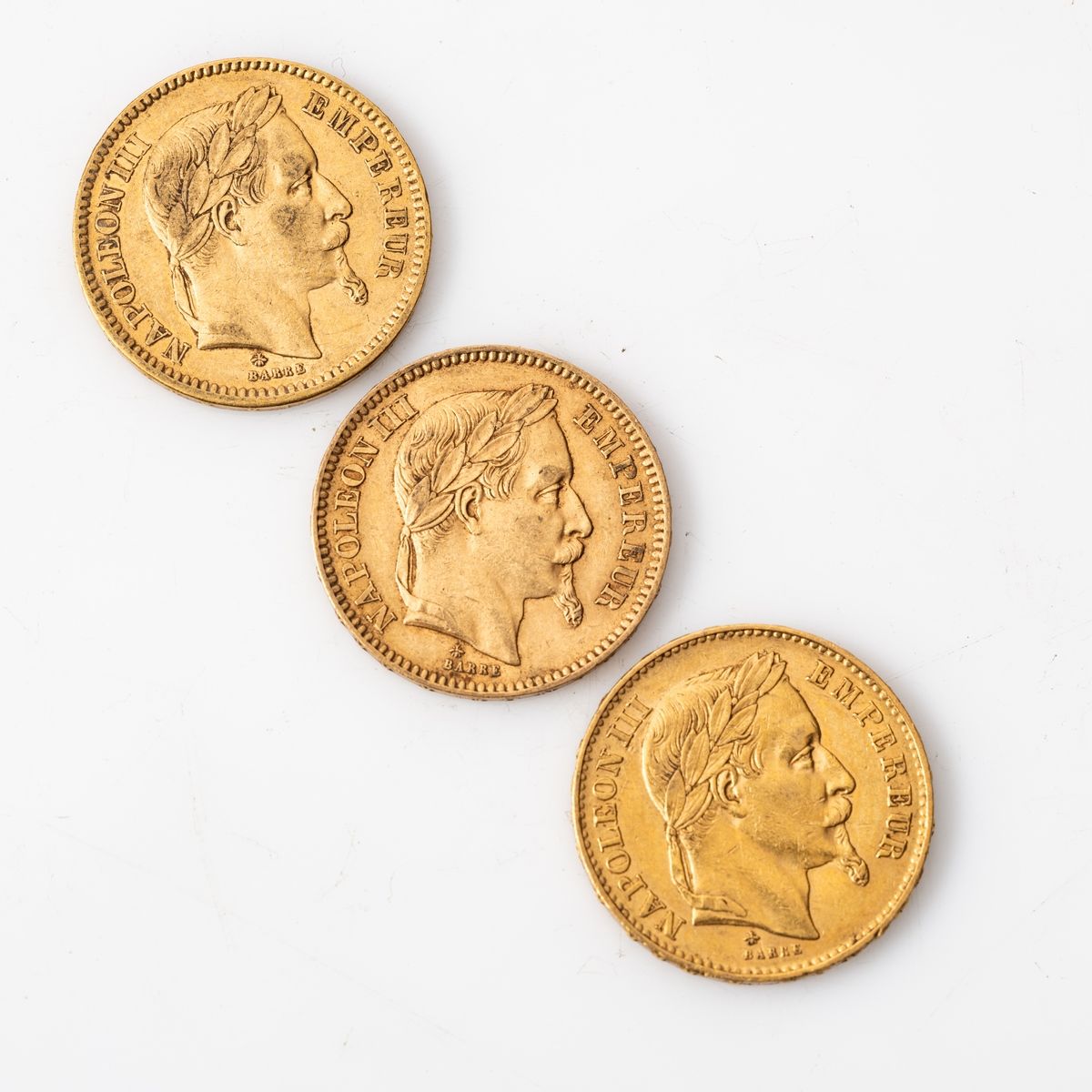 Null Trois pièces en or de 20 francs Napoléon III tête laurée - 1864 A - 1865 A &hellip;