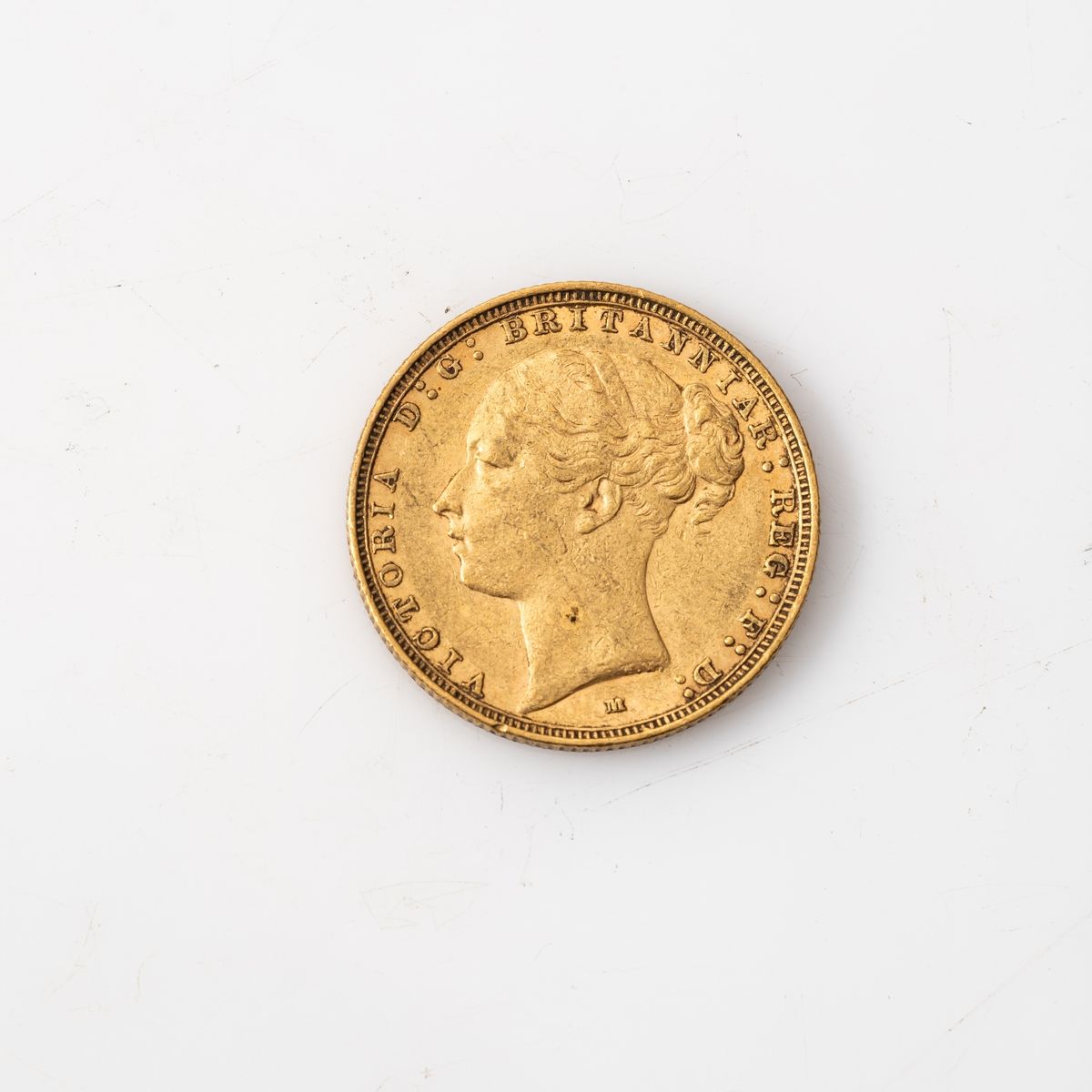 Null Moneta d'oro da 1 Sovrana Vittoria testa giovane (1886).

Peso: 7,98 g.