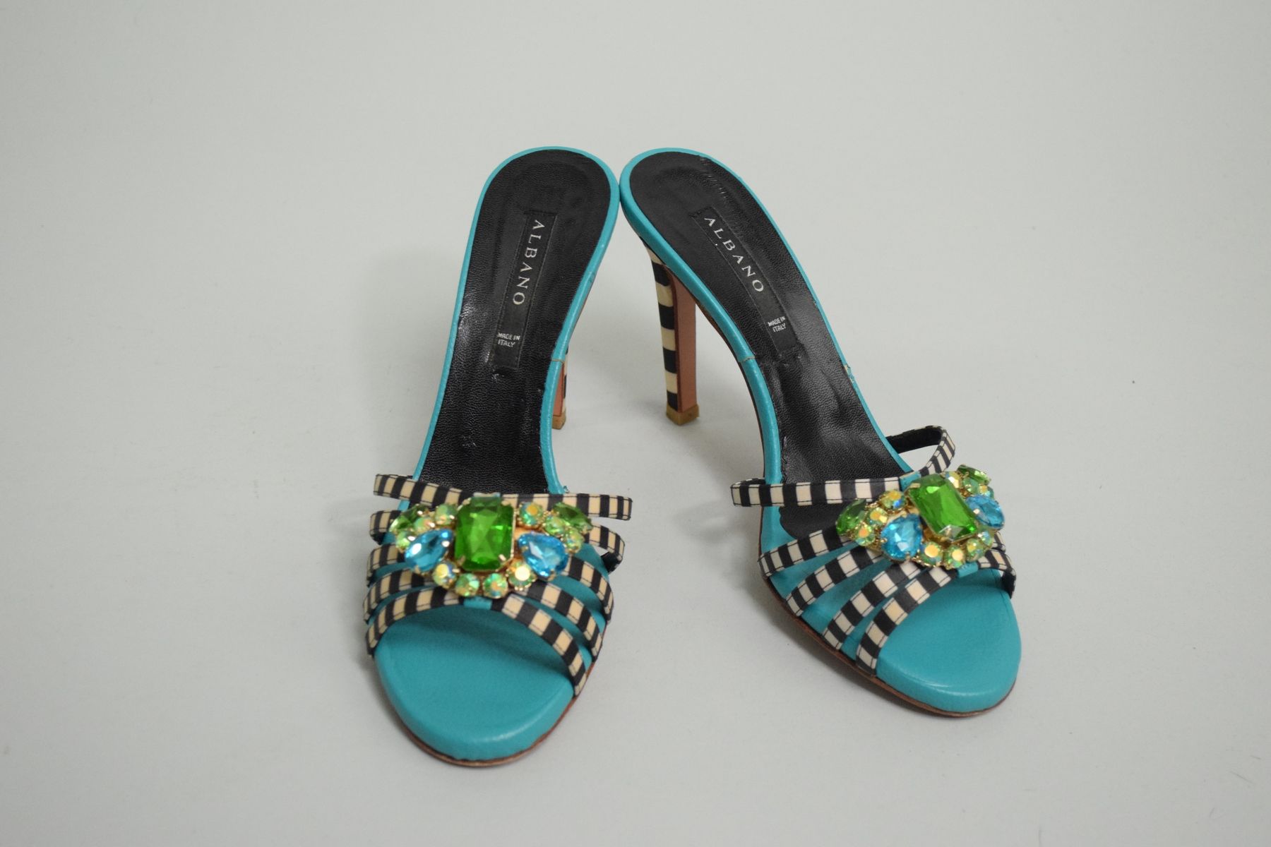 Null ALBANO

Pair of turquoise mules with zebra straps decorated with green and &hellip;