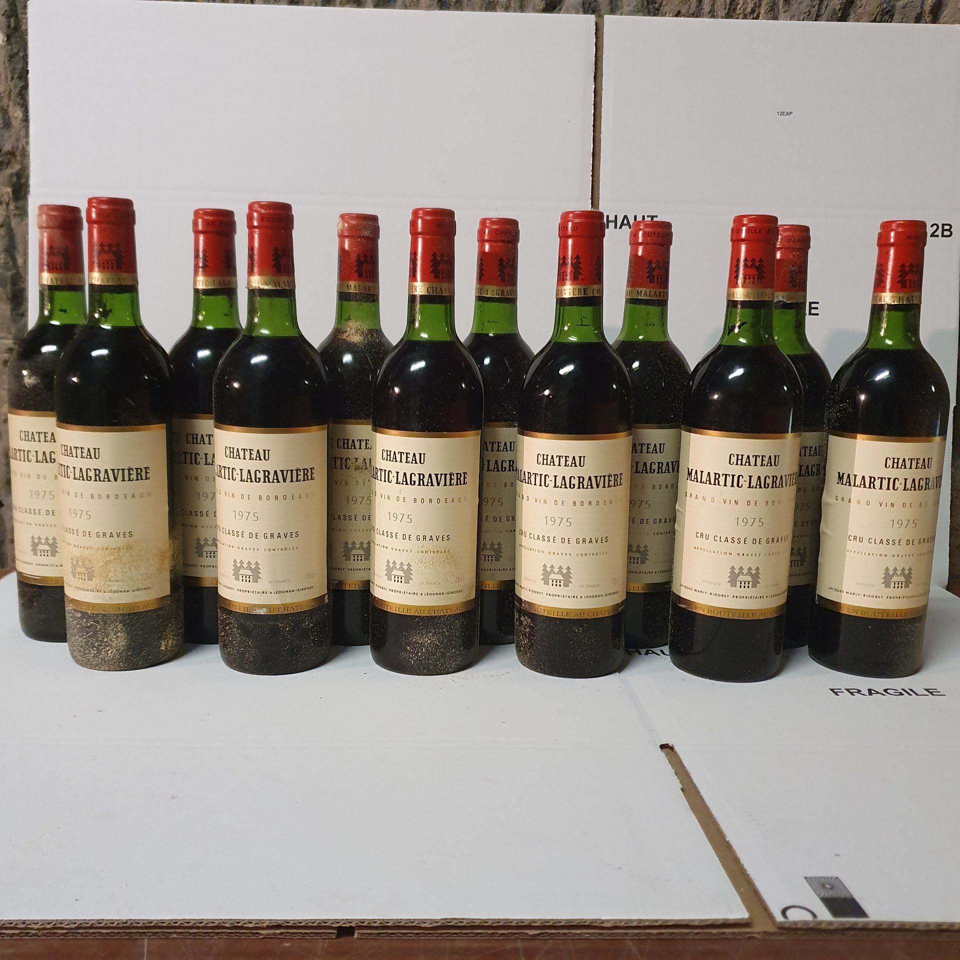Null 12 bottiglie Château MALARTIC-LAGRAVIERE, Pessac-Léognan 1975 CB 5LB, 1MB
