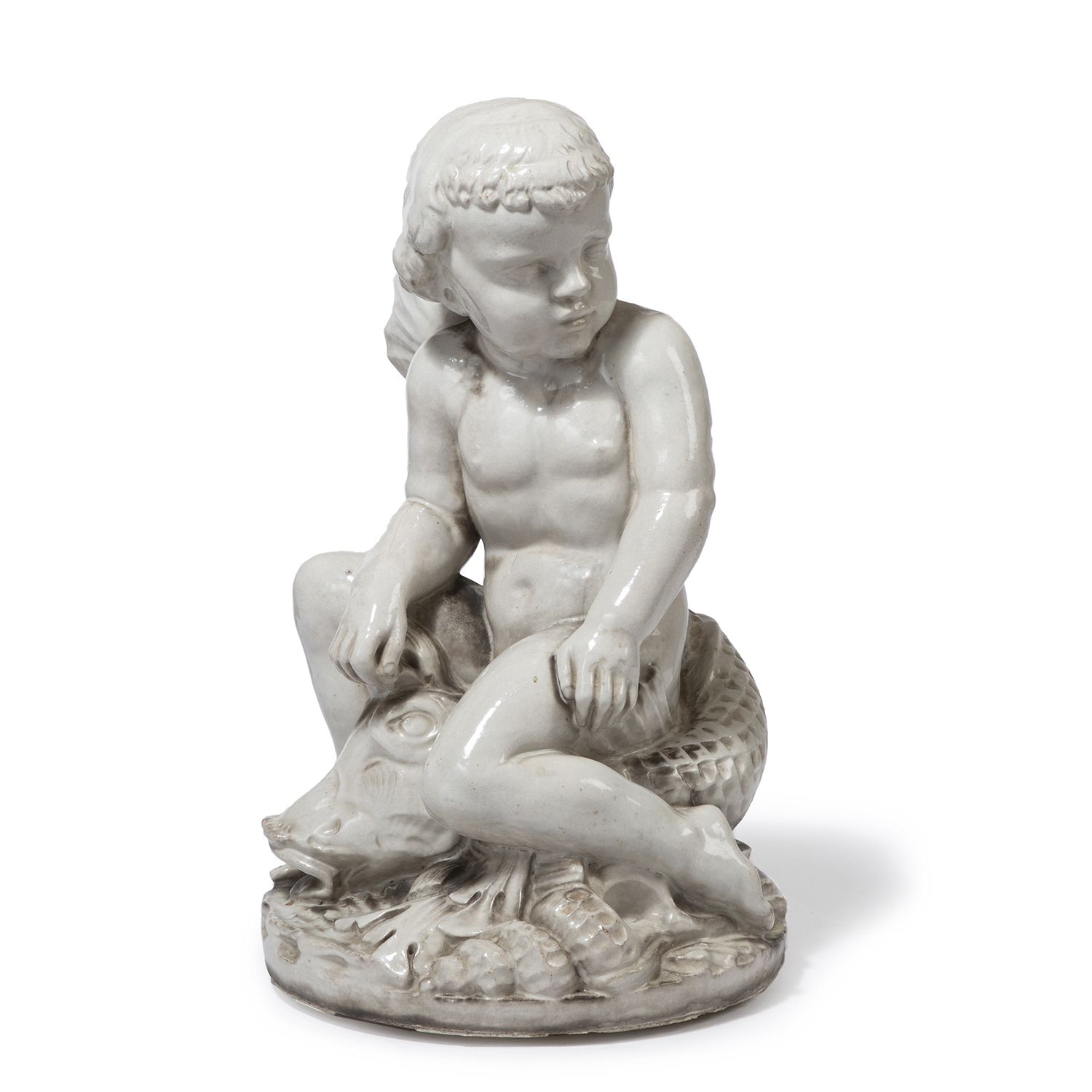 Null 路易斯-苏伊（归属）

表现海豚上的普提的陶器雕塑，由海藻浮雕组成的圆形露台。

一个陶器雕塑。

高56 x 深35 CM - 高22 x 宽13 &hellip;