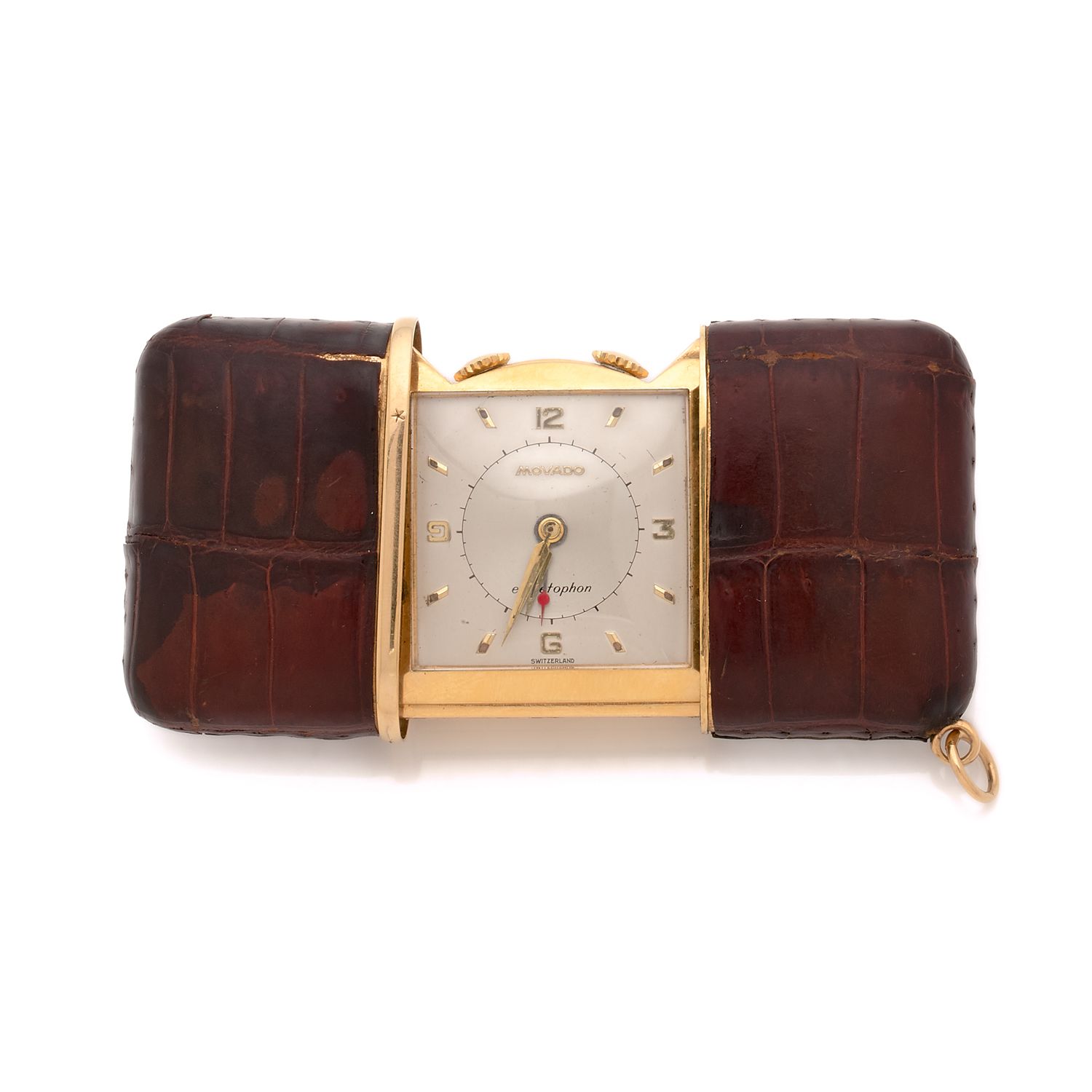 Null モモドル

鄂尔多斯市

1960'S

带闹钟的袋装手表。

箱子：黄色鎏金金属，带滑动开口，用皮革包裹。表盘：双色银色，带应用指数和叶形指针。

&hellip;