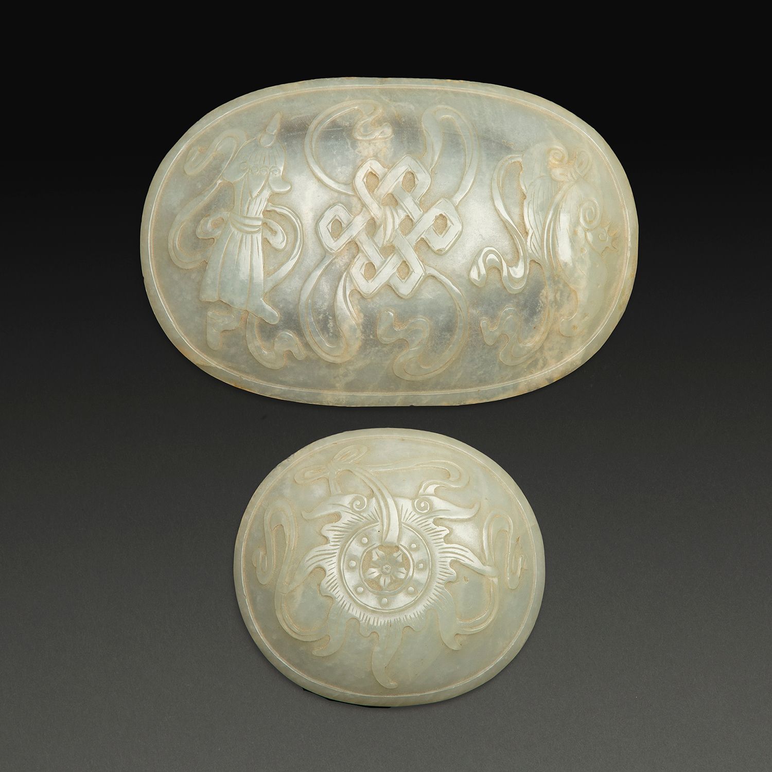 Null SET OF TWO RUYI SCEPTRE PLAQUES
in white celadon jade, oval shape, decorate&hellip;