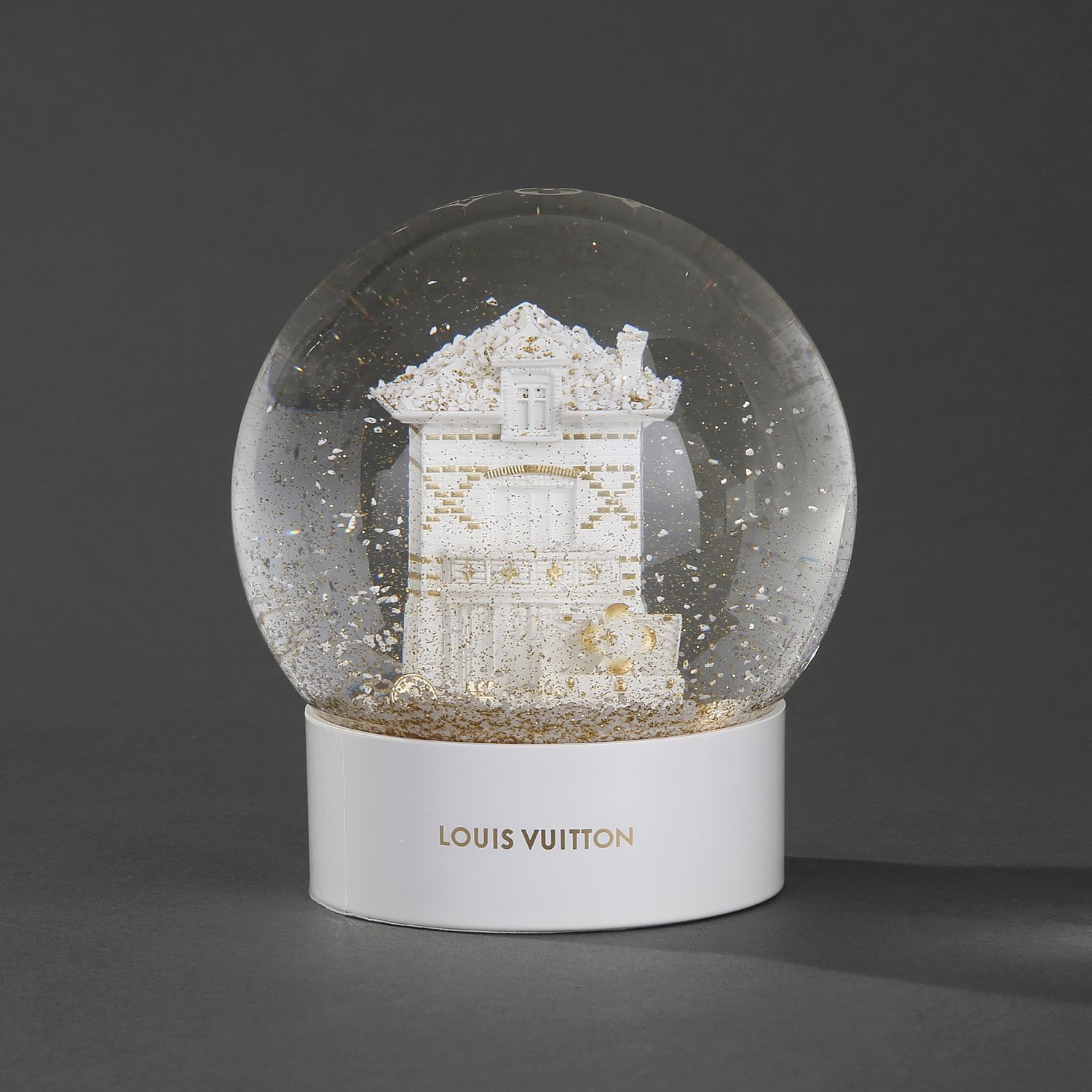 Louis VUITTON, Snow globe featuring the Maison d'Asnière…