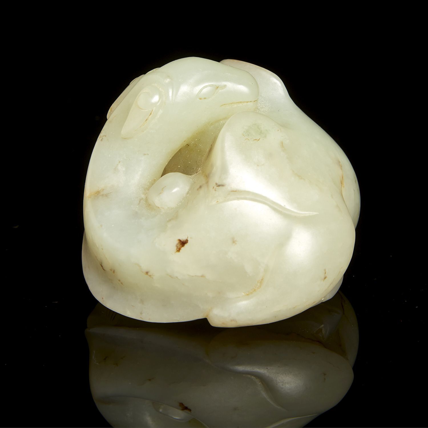 Null SUBJECT
in celadon white jade slightly veined with rust representing a sitt&hellip;