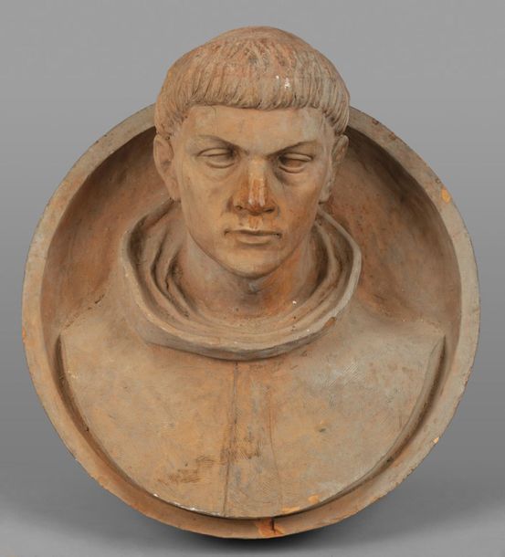 OGGETTISTICA Terracotta medallion with head of fraticello sec.XIXdiam
.Cm.50