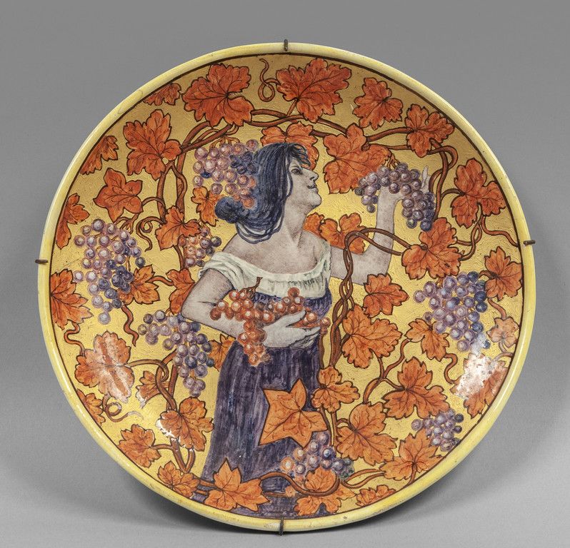 OGGETTISTICA 收割机陶瓷盘，金底多色装饰，背面有R.Passarin的签名
，直径32cm。
