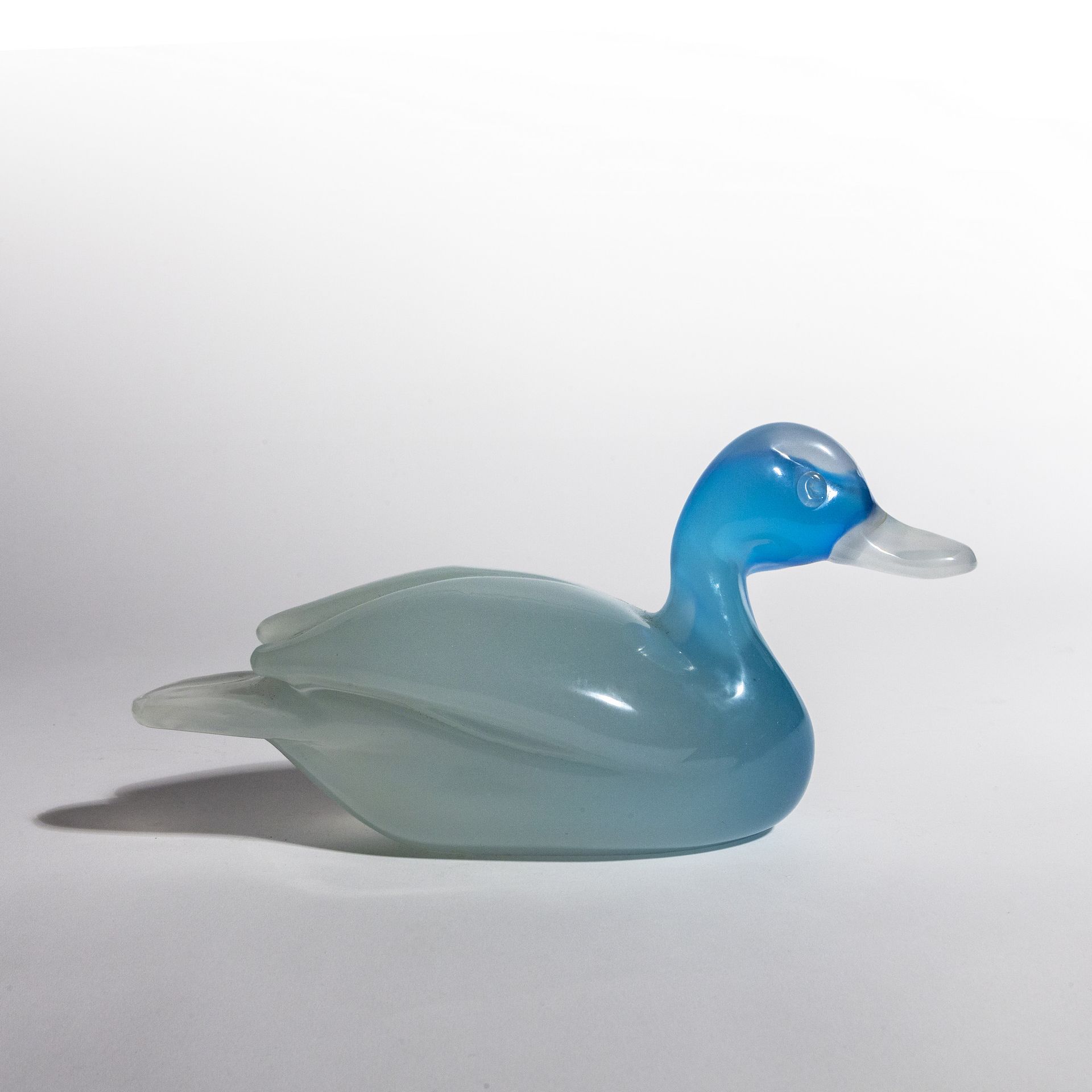 SEGUSO Archimède ARCHIMEDE SEGUSO
Figur einer Ente aus hellblau schattiertem Opa&hellip;