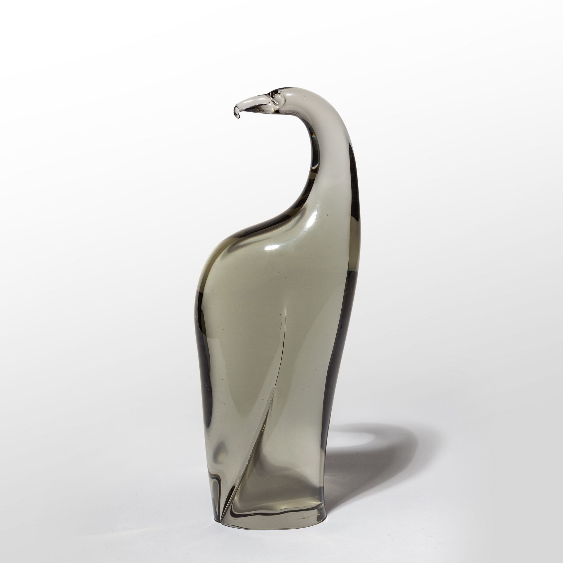 SEGUSO LIVIO LIVIO SEGUSO MURANO
透明实心玻璃中的鹰的形象，大约在1950年
刻有字母 "LS "
高度为31厘米。