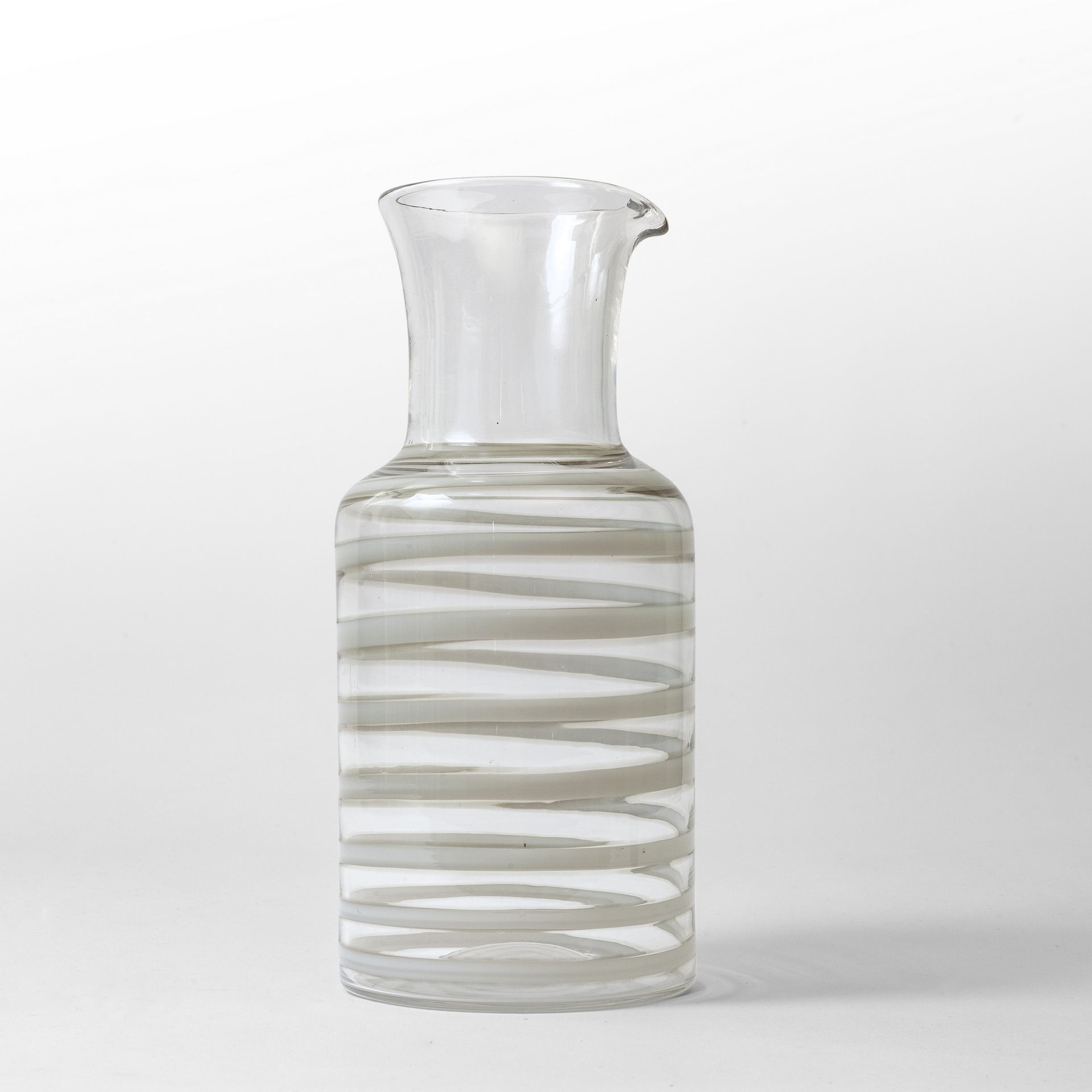 SCARPA Carlo CARLO SCARPA VENINI
A transparent glass jug with a spiral decoratio&hellip;