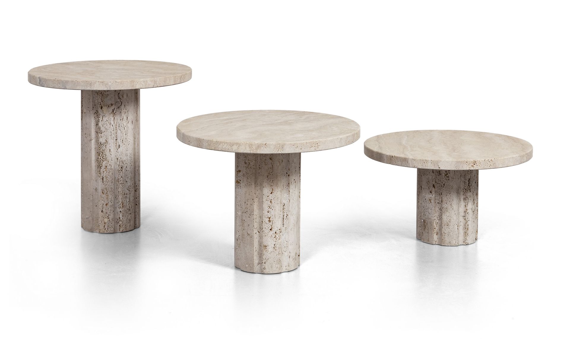 TAVOLINO THREE TABLE '70s. 
Travertine. 
Height cm 28 38 48 diameter cm 50.