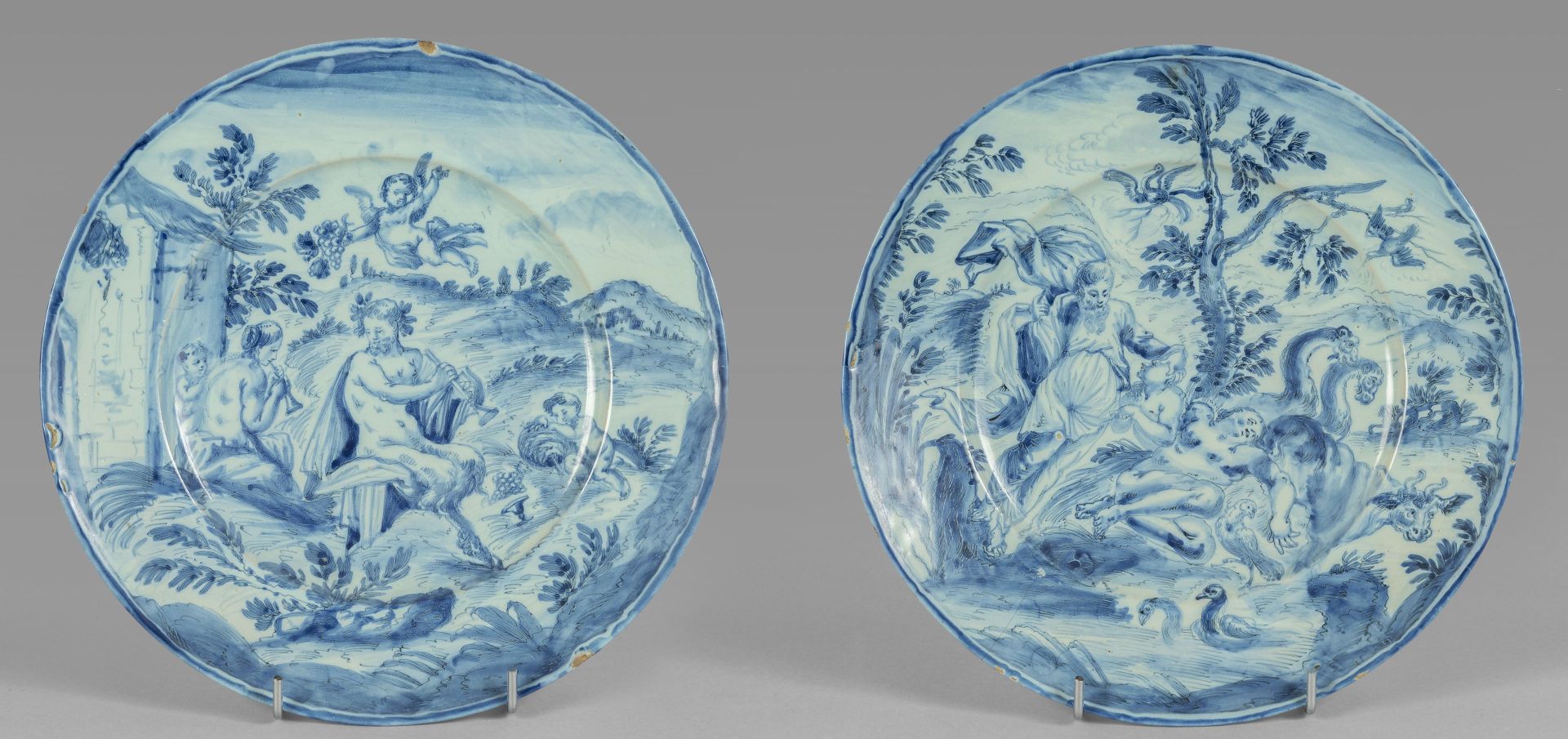 OGGETTISTICA Pair of majolica plates decorated with classical scenes brand Savon&hellip;