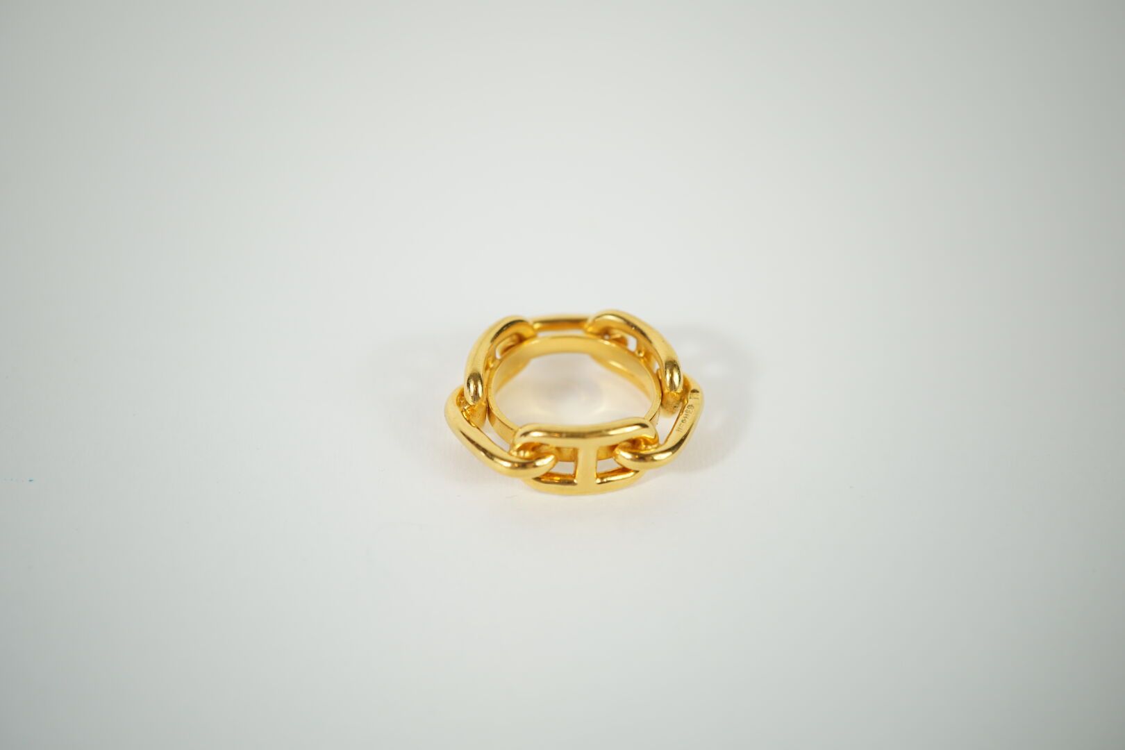 Null HERMES. Gold-plated metal scarf ring. Marked Hermes.