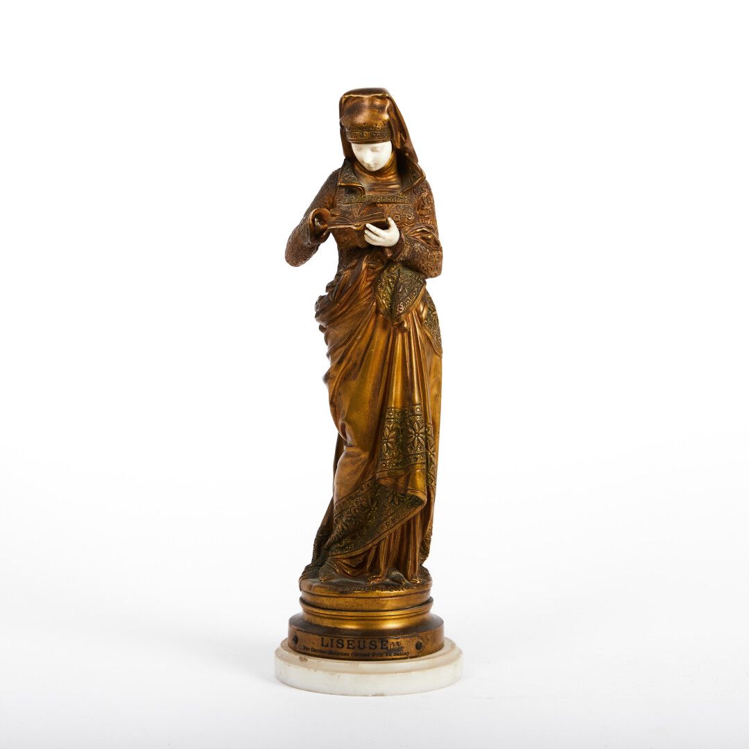 Null 阿尔伯特-埃内斯-卡里尔-贝卢斯(1824-1887)

"读者"。

菊花象雕像：鎏金铜和象牙雕刻。

签名。

（缺少一只象牙的手）

高度：33&hellip;