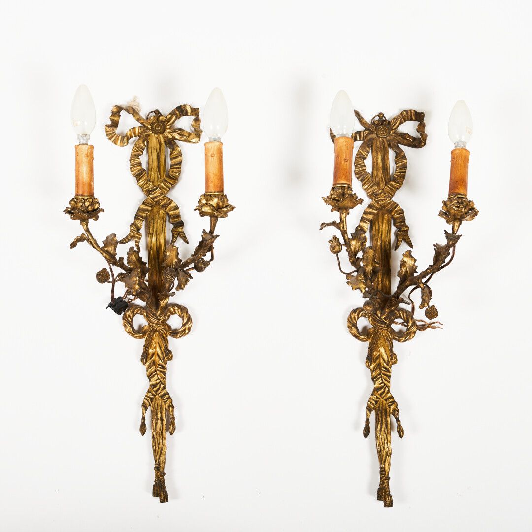 Null A pair of ormolu sconces with two lights, with ribbon bows, trimmings, foli&hellip;