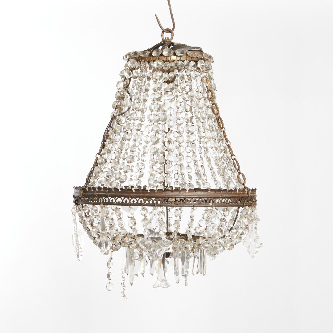 Null A brass basket chandelier with cut crystal beads, plates and knives.

19th &hellip;