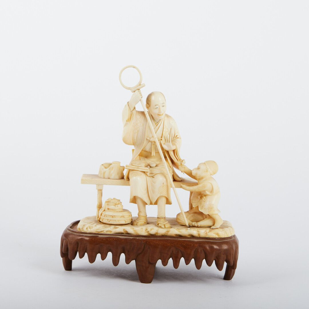 Null 
"Monkey showman sitting on a bench.




Carved ivory.




Red stamp.




J&hellip;