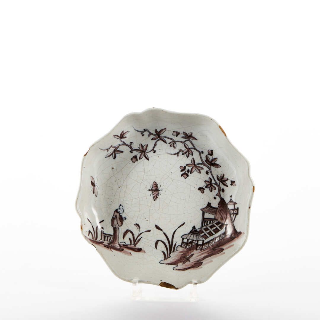 Null 圣阿曼德或圣欧麦尔

锰质山水纹陶碗。

18世纪。

直径：23厘米

(筹码)