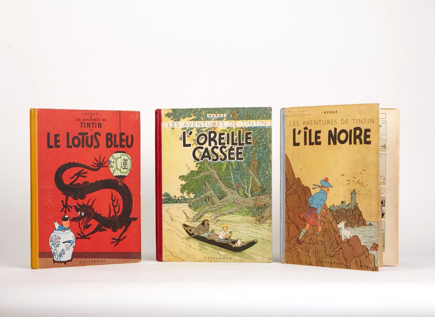 Null 3 volumes Les Aventures de Tintin : 

1 - "Le Lotus bleu" Dos jaune, B10, g&hellip;