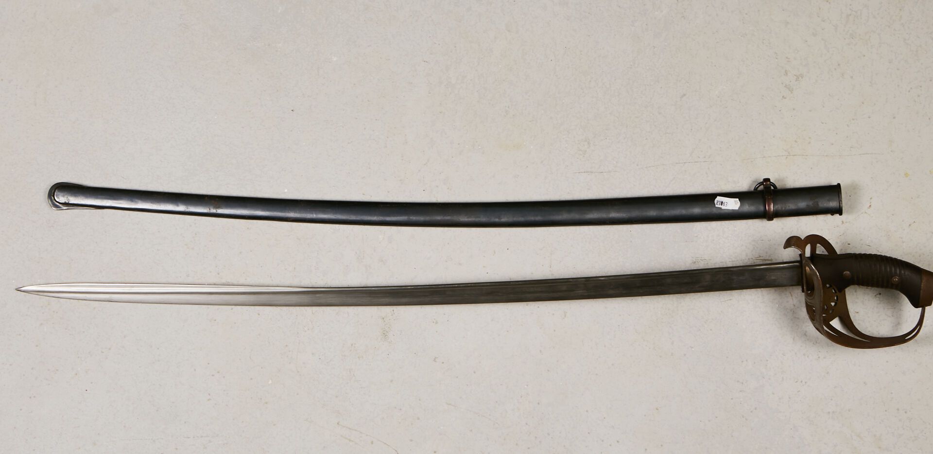 Null Chilean cavalry saber, model 1898. 
Compressed rubber handle. Iron mounting&hellip;