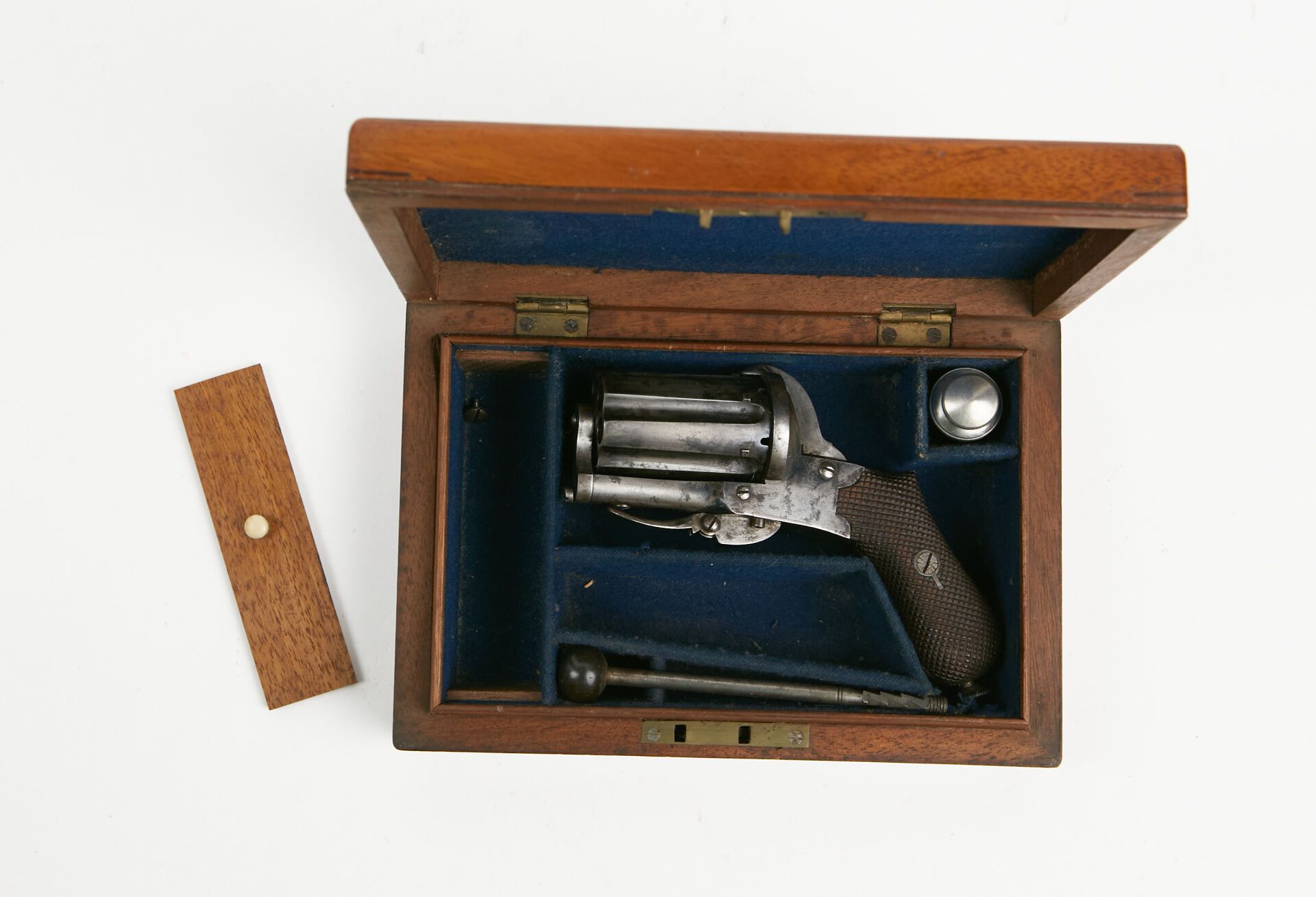 Null Necessary cassette containing a pinfire pepperbox revolver. 
Sheathed in bl&hellip;