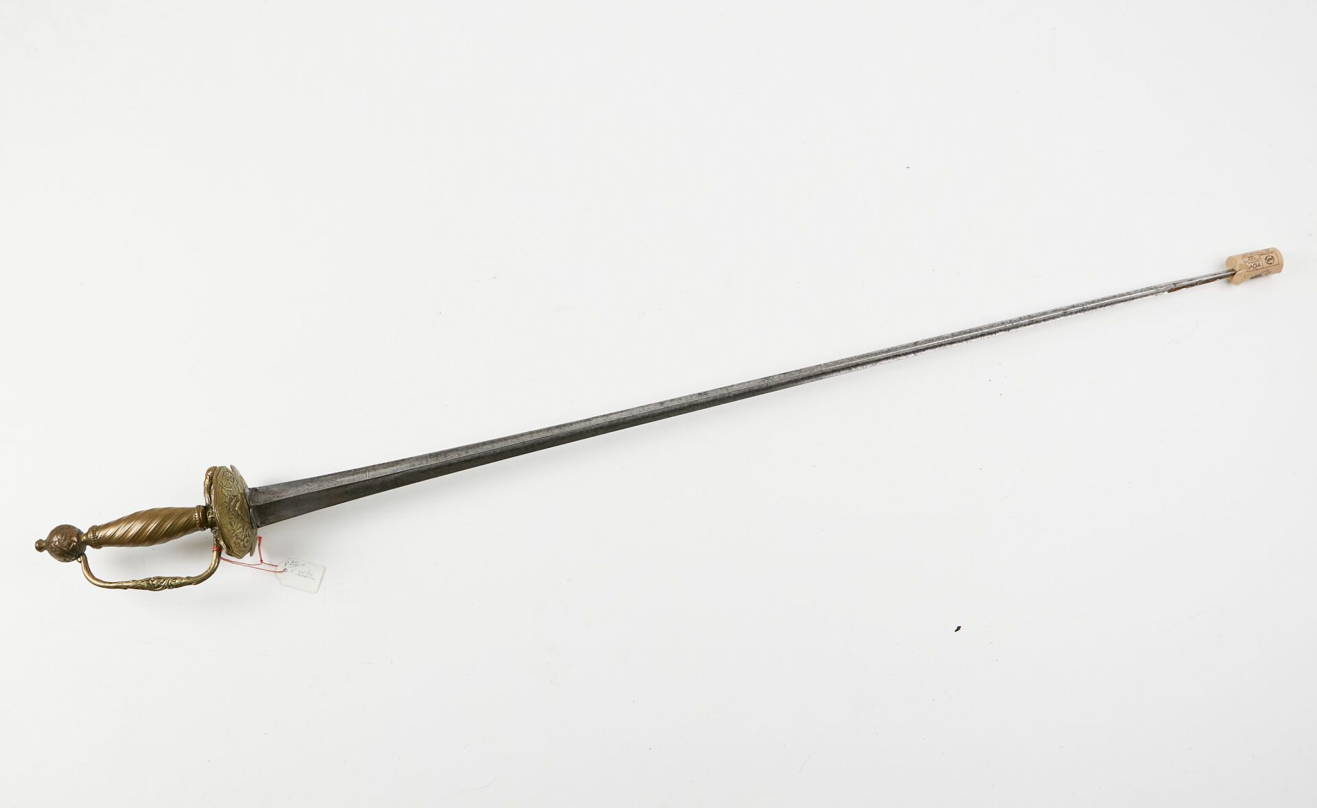 Null Officer's sword.
Chased brass mounting, single-branch guard, donkey step an&hellip;