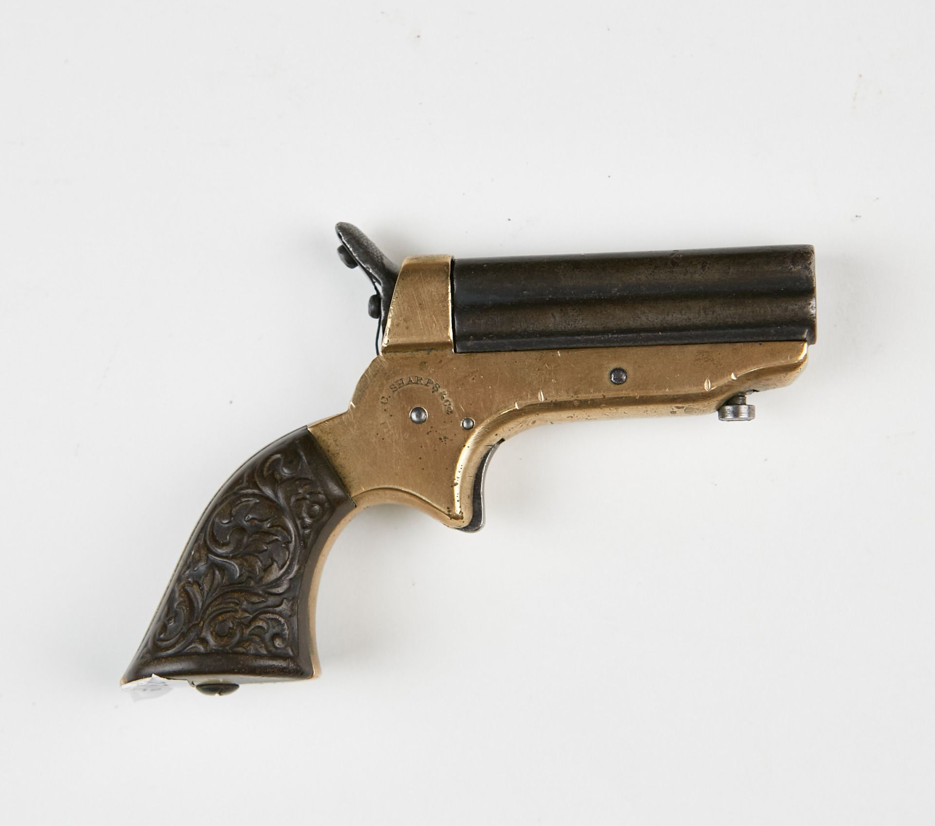 Null Sharps pistol, four-shot, 22 caliber rimfire. 
Four barrels. Brass toggle w&hellip;
